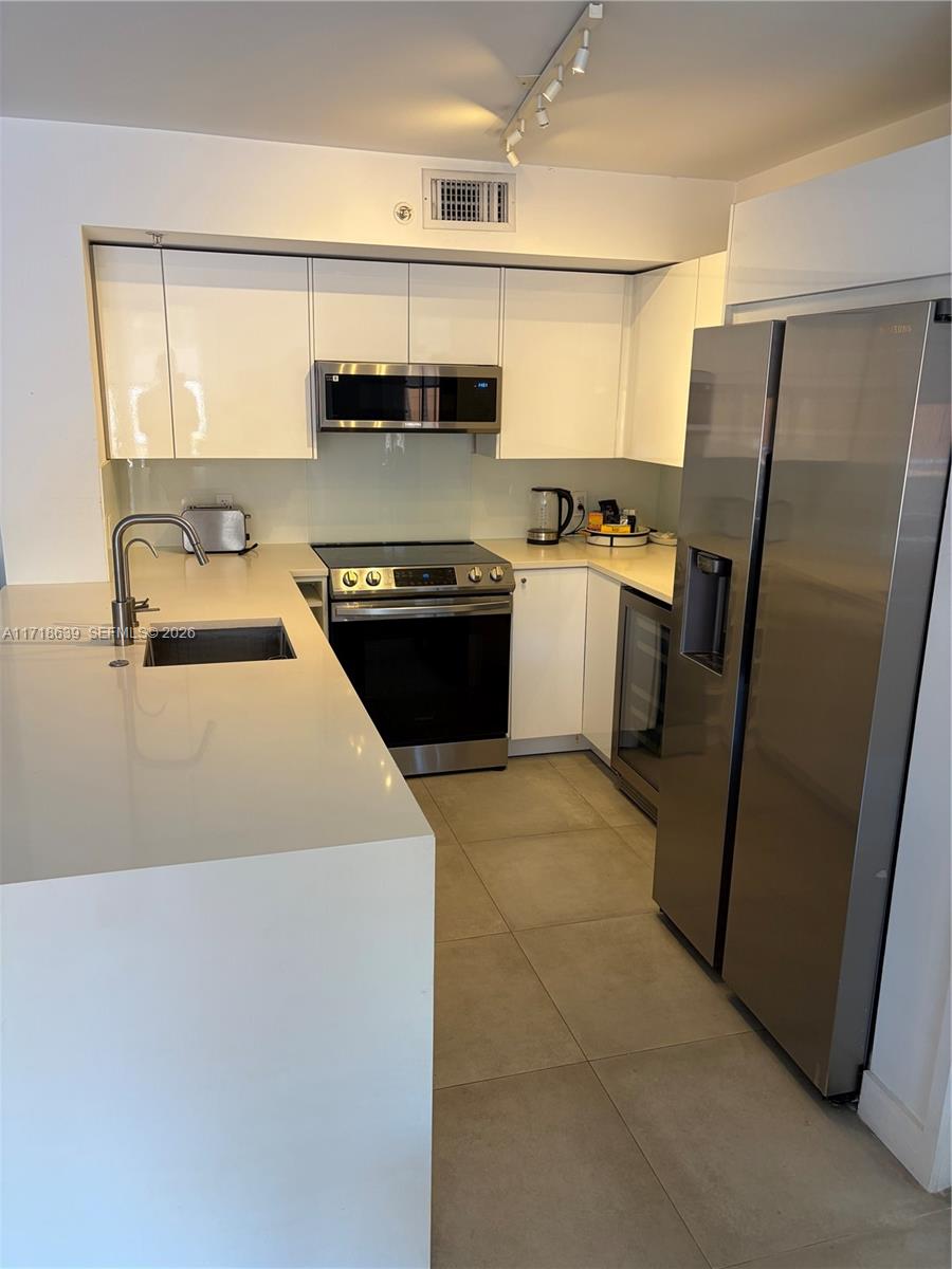 90 Alton Rd #303, Miami Beach FL 33139