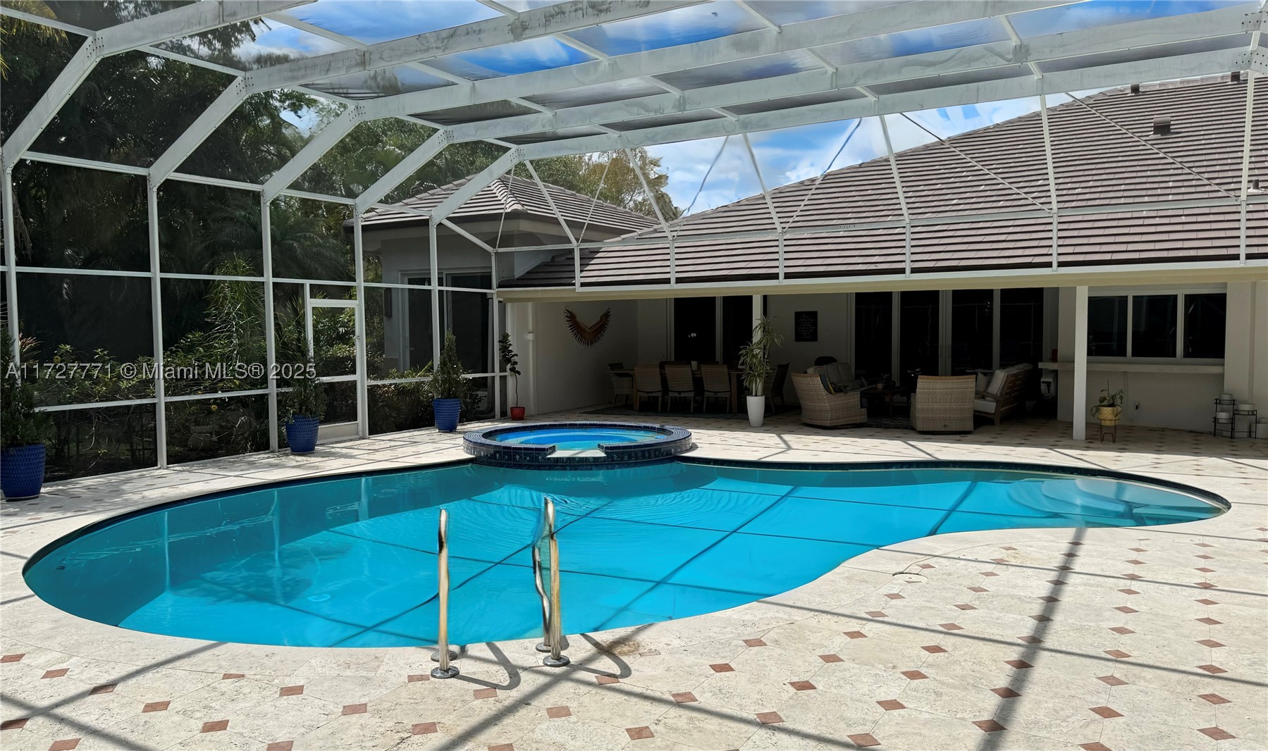 7700 S Woodridge Dr, Parkland FL 33067