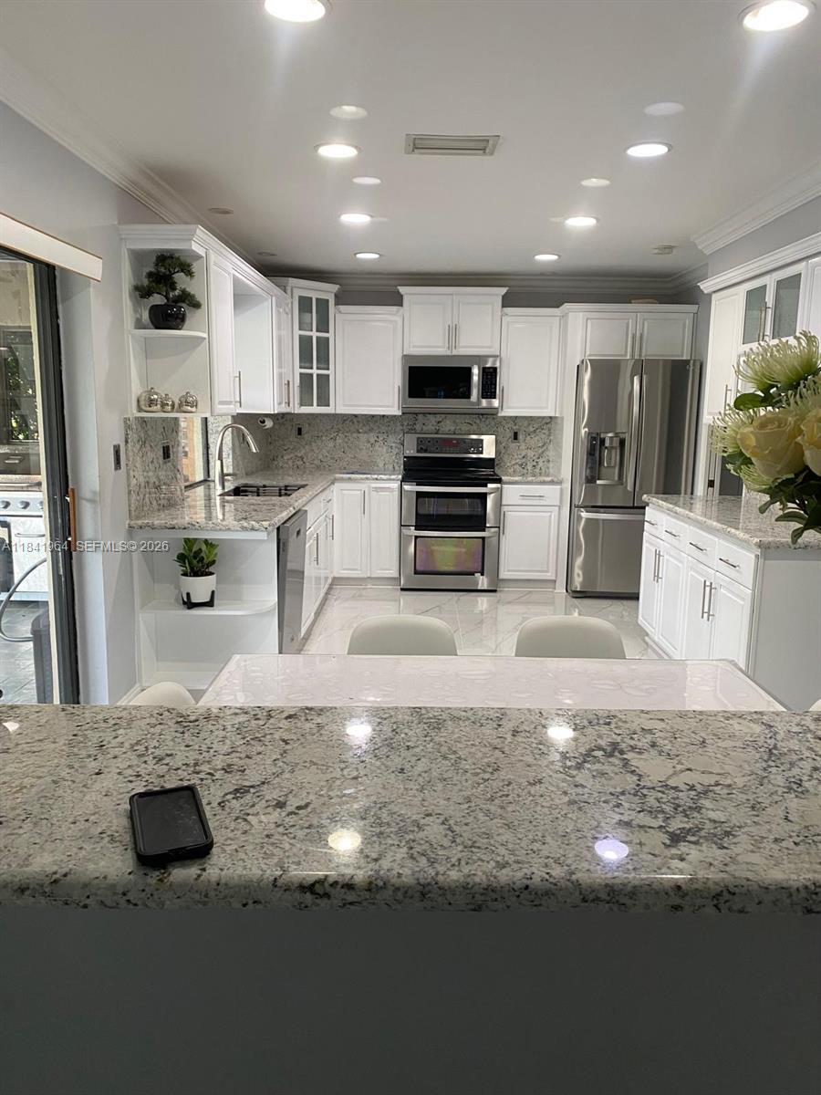 10126 Crosswind Rd, Boca Raton FL 33498
