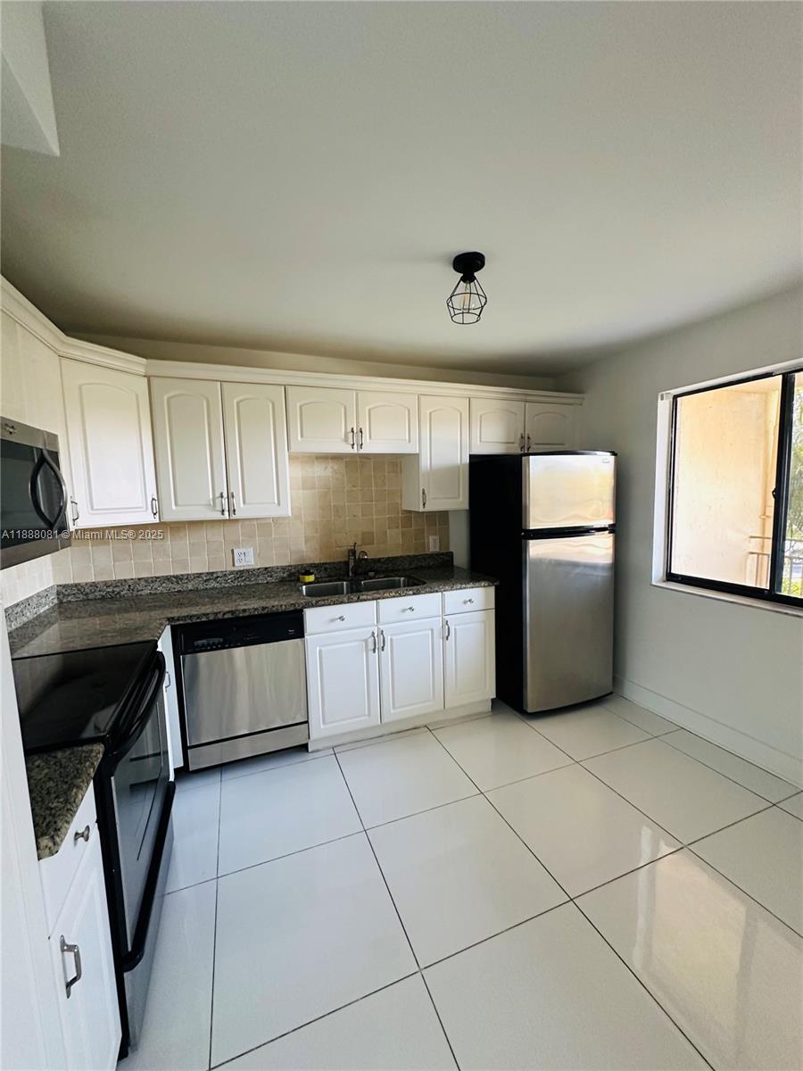 16491 Blatt Blvd #202, Weston FL 33326