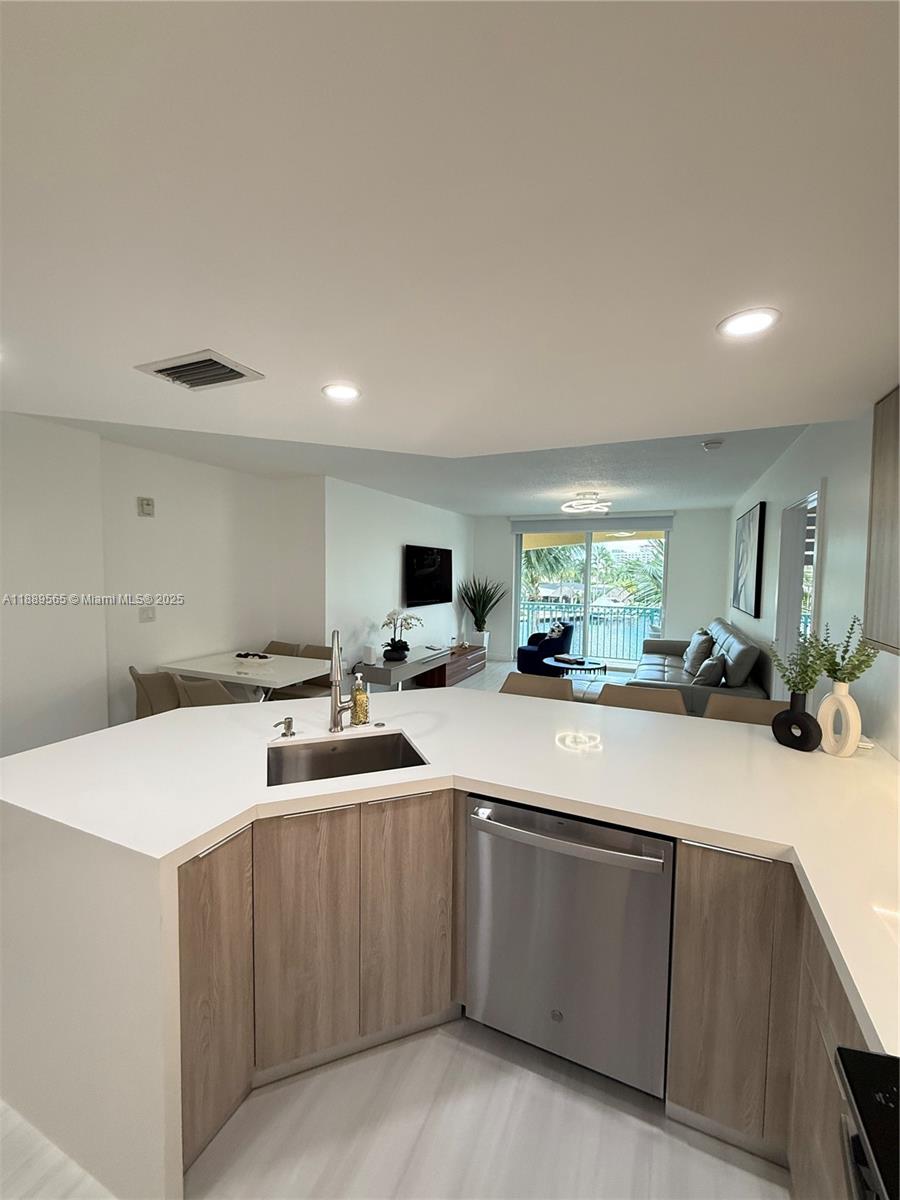 201 Golden Isles Dr #302, Hallandale Beach FL 33009