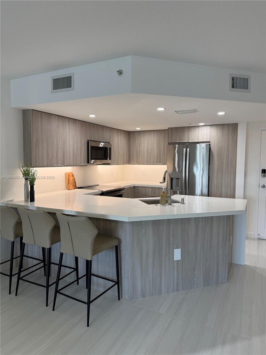 201 Golden Isles Dr #302, Hallandale Beach FL 33009
