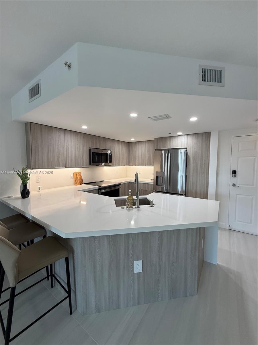 201 Golden Isles Dr #302, Hallandale Beach FL 33009