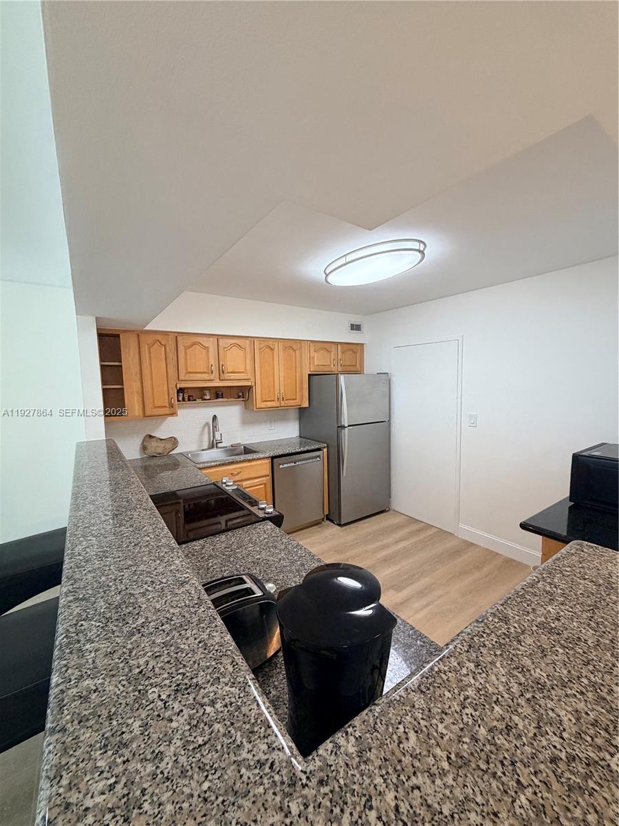 5151 Collins Ave #730 + DEN, Miami Beach FL 33140