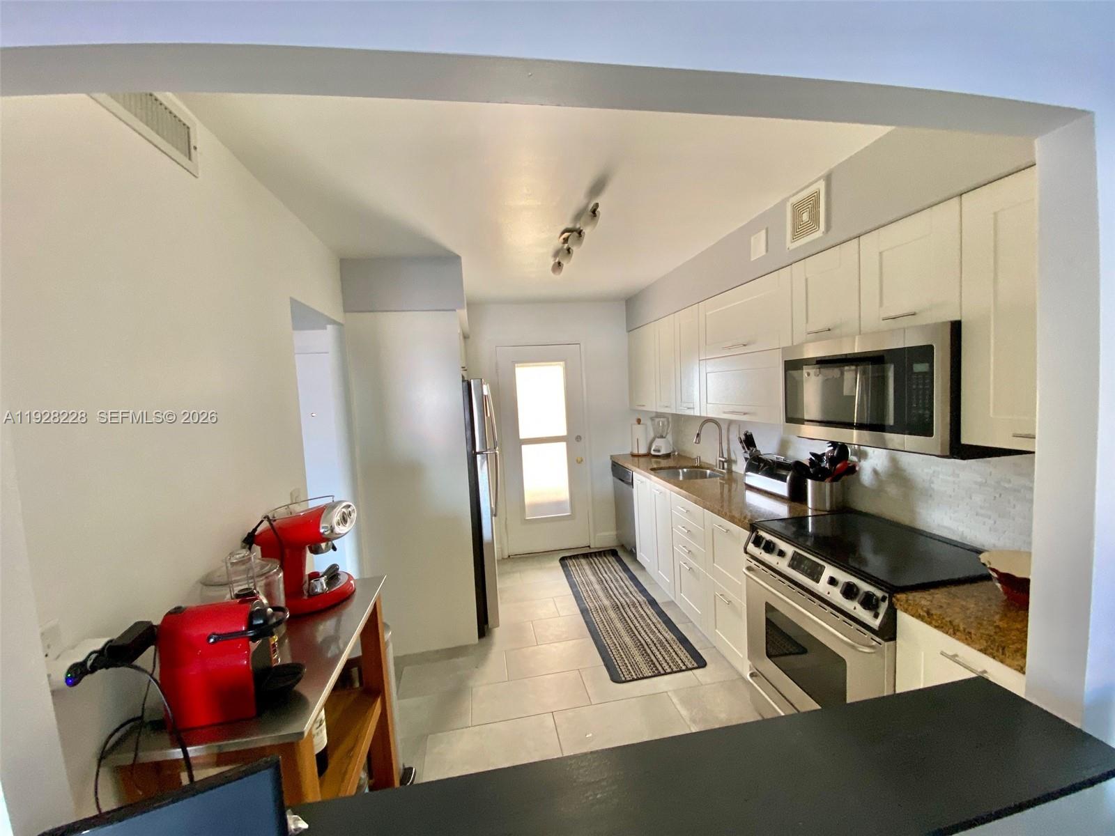 400 Golden Isles Dr #6, Hallandale Beach FL 33009