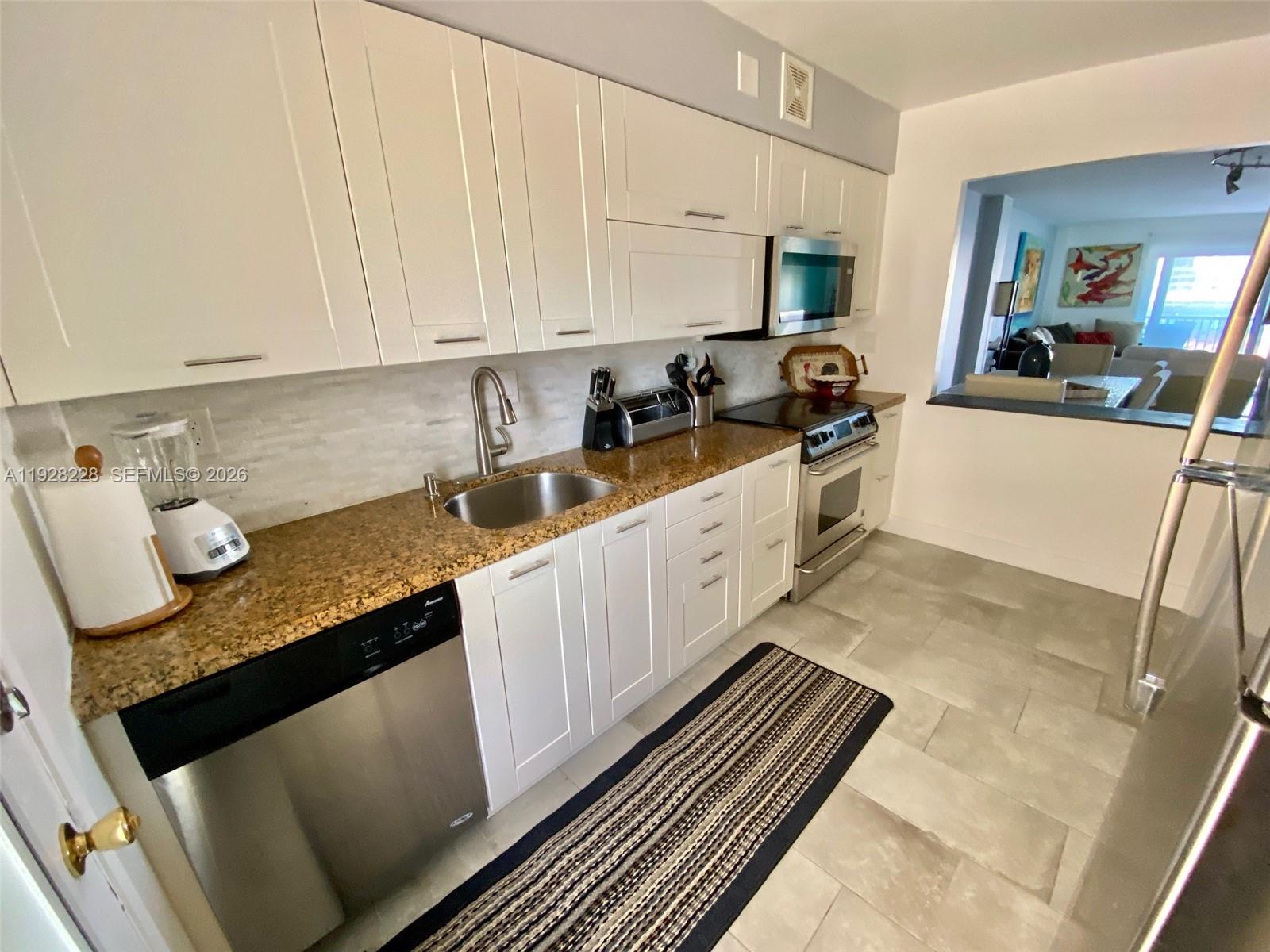 400 Golden Isles Dr #6, Hallandale Beach FL 33009