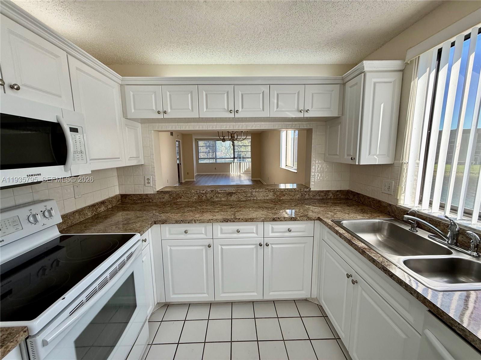 10426 E Clairmont Cir #212, Tamarac FL 33321
