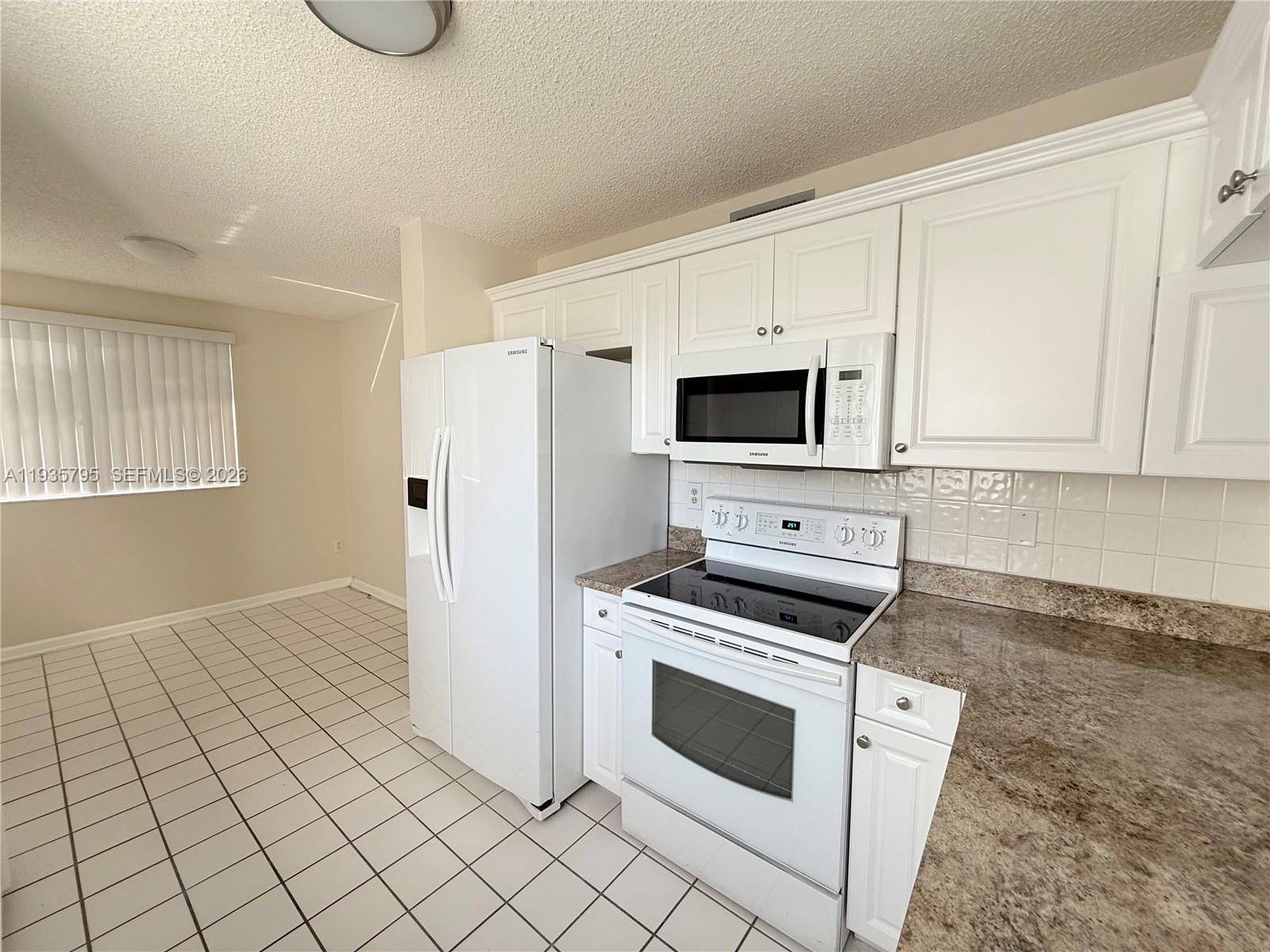 10426 E Clairmont Cir #212, Tamarac FL 33321