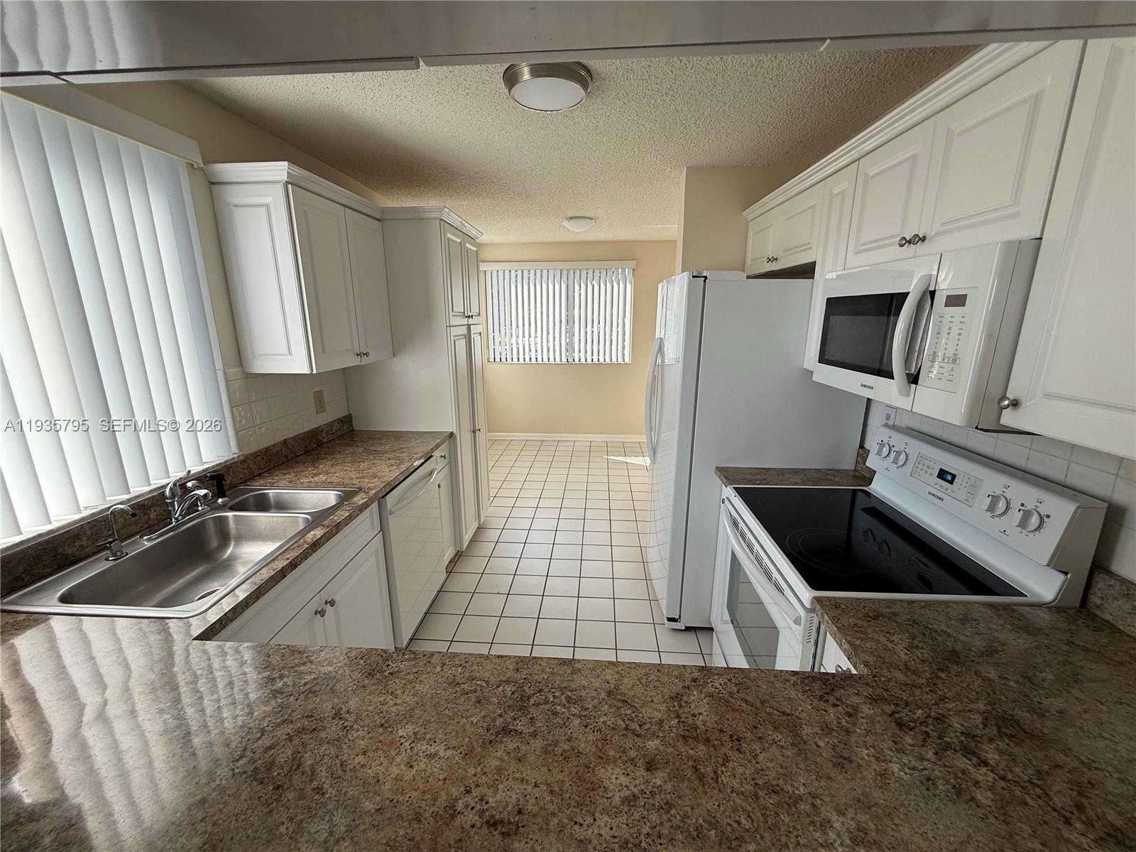 10426 E Clairmont Cir #212, Tamarac FL 33321