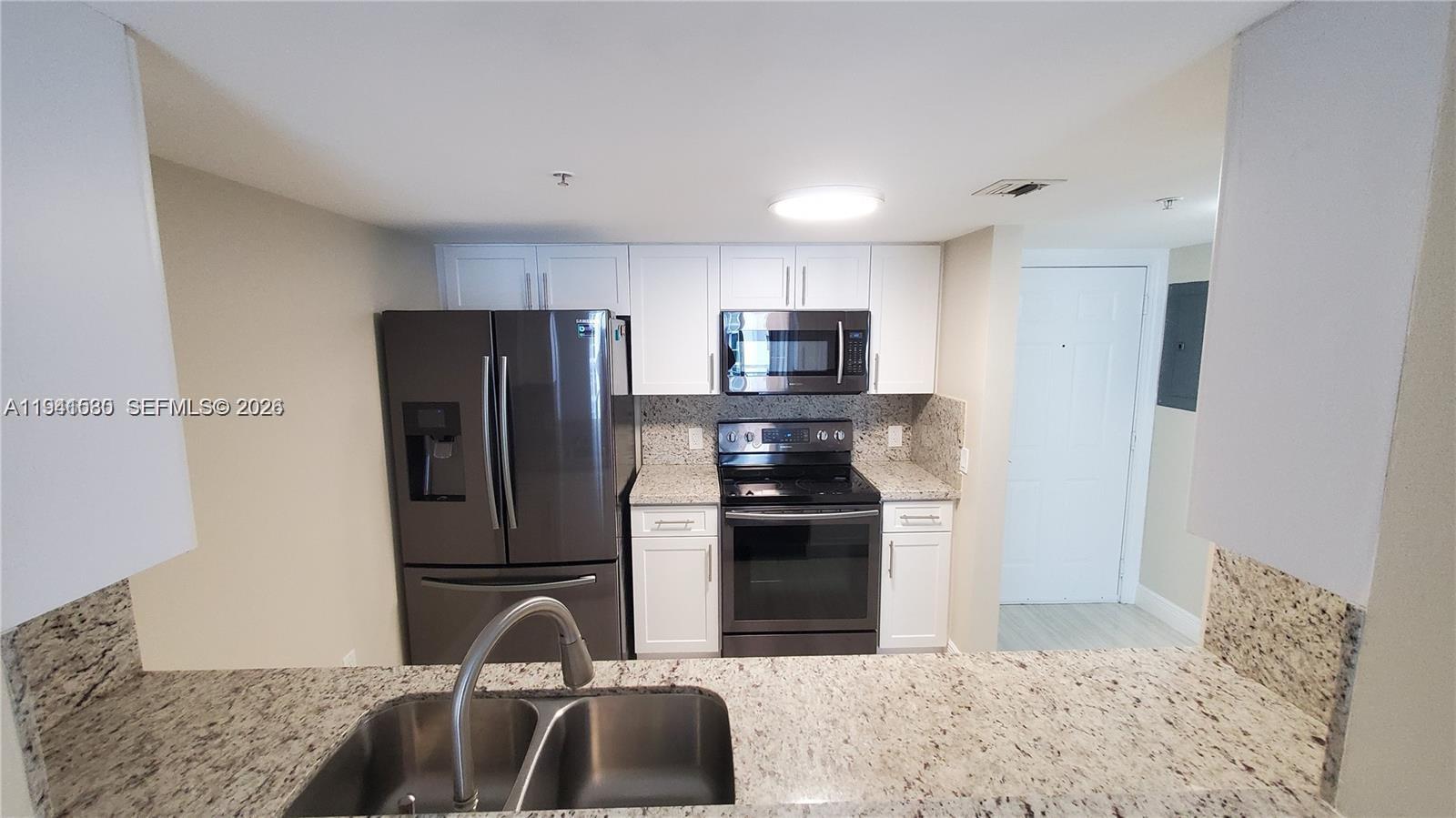 60 NW 37th Ave #806, Miami FL 33125