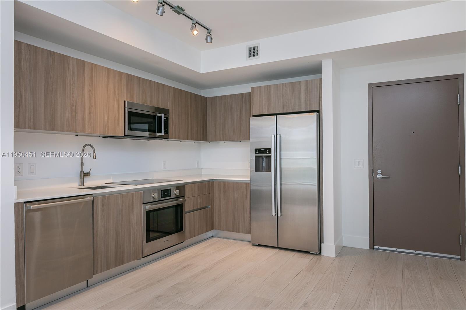 201 SW 17th Rd #303, Miami FL 33129