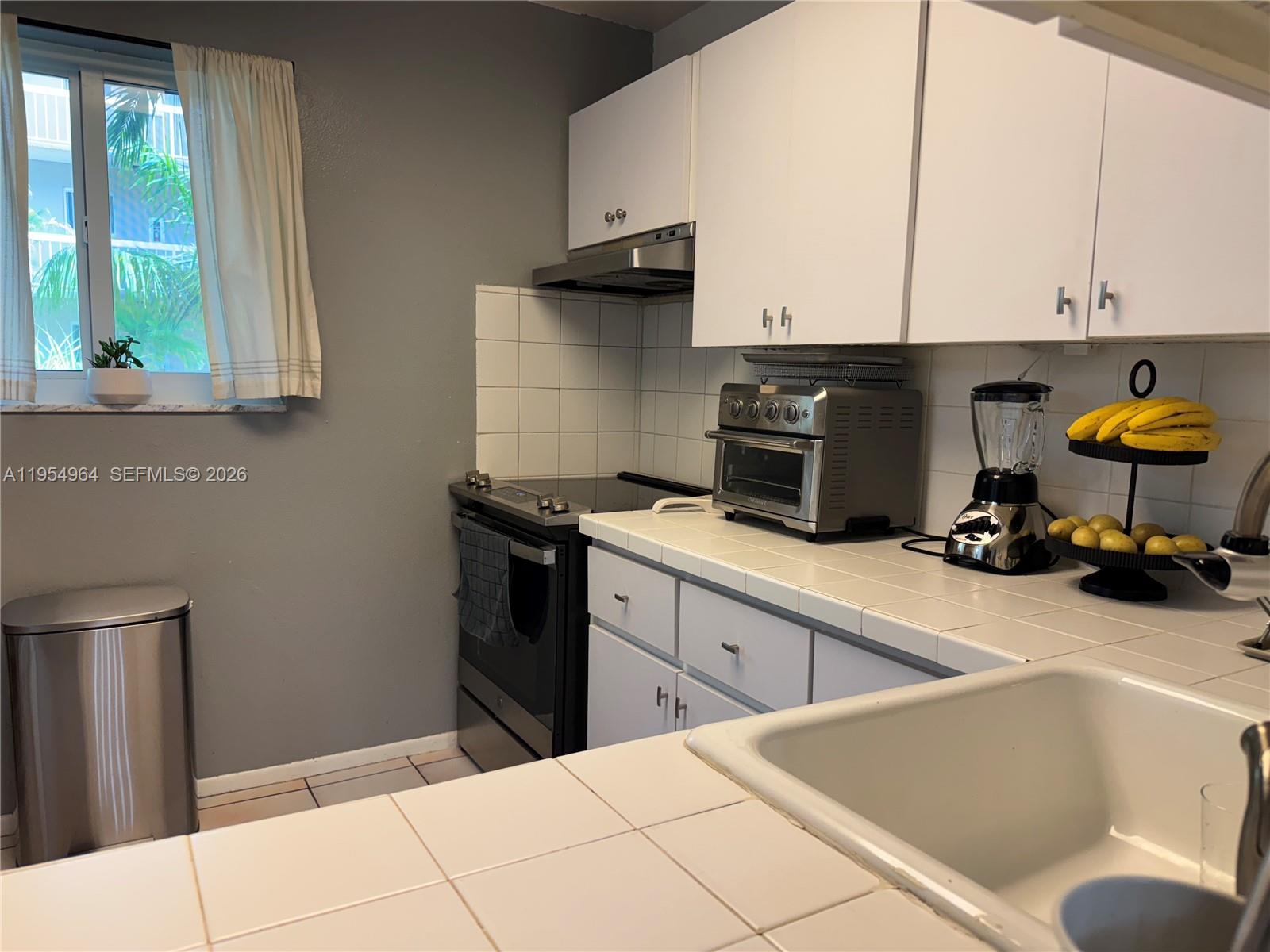 7703 Camino Real #A106, Miami FL 33143