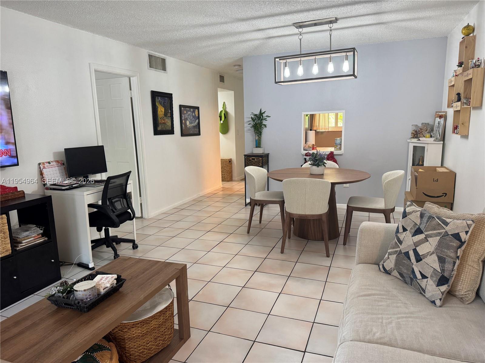 7703 Camino Real #A106, Miami FL 33143