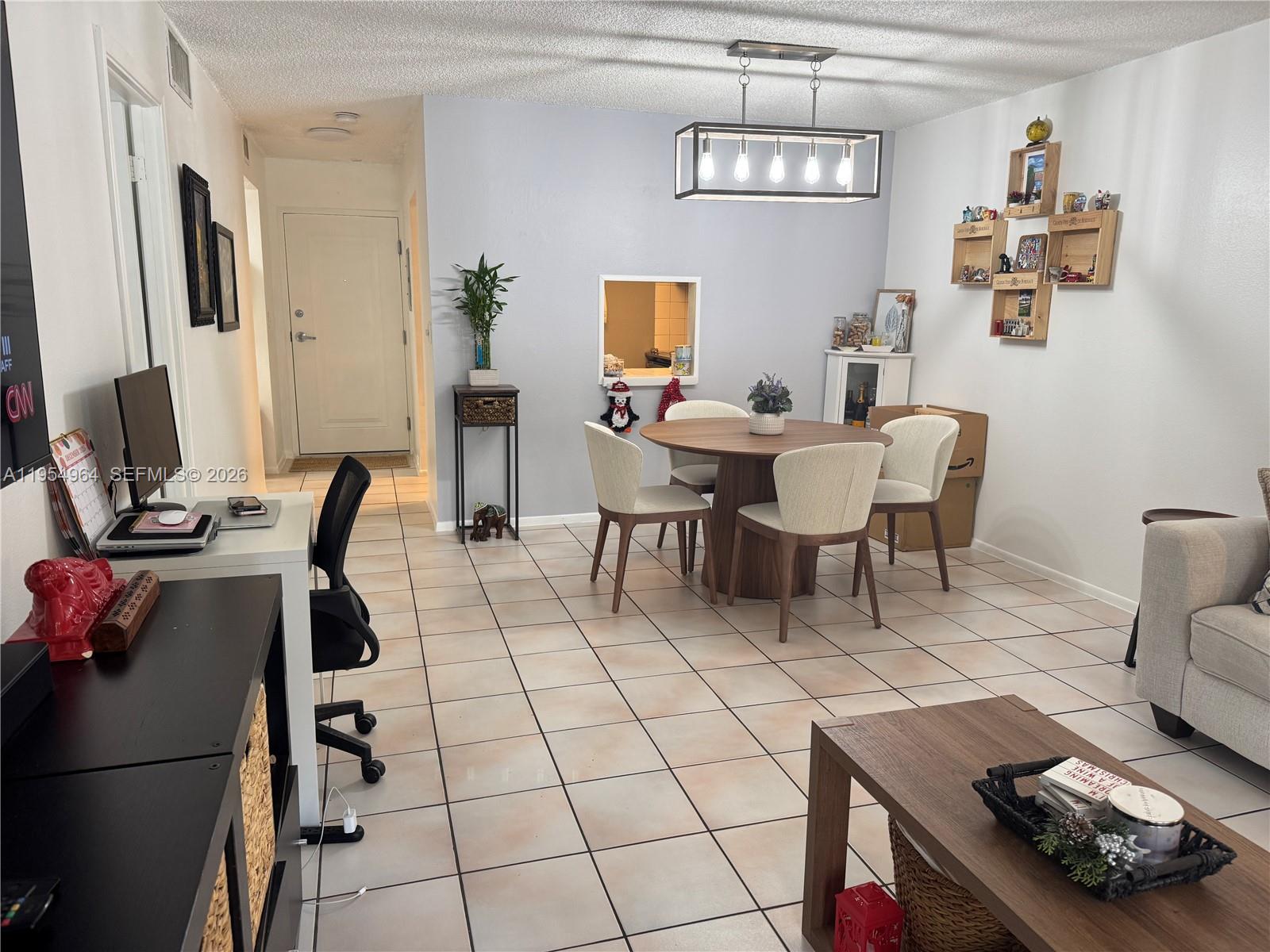 7703 Camino Real #A106, Miami FL 33143