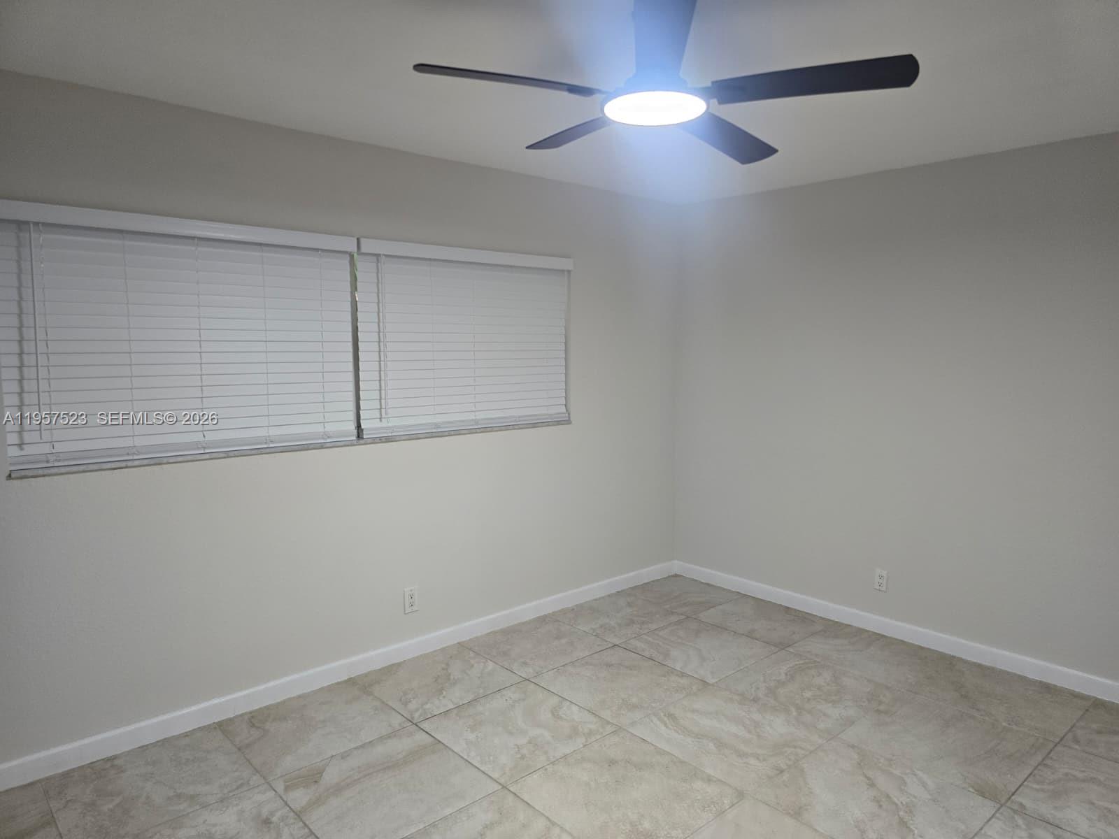 5151 W Oakland Park Blvd #303, Lauderdale Lakes FL 33313