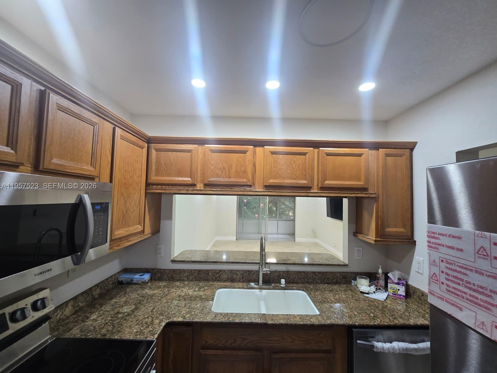 5151 W Oakland Park Blvd #303, Lauderdale Lakes FL 33313