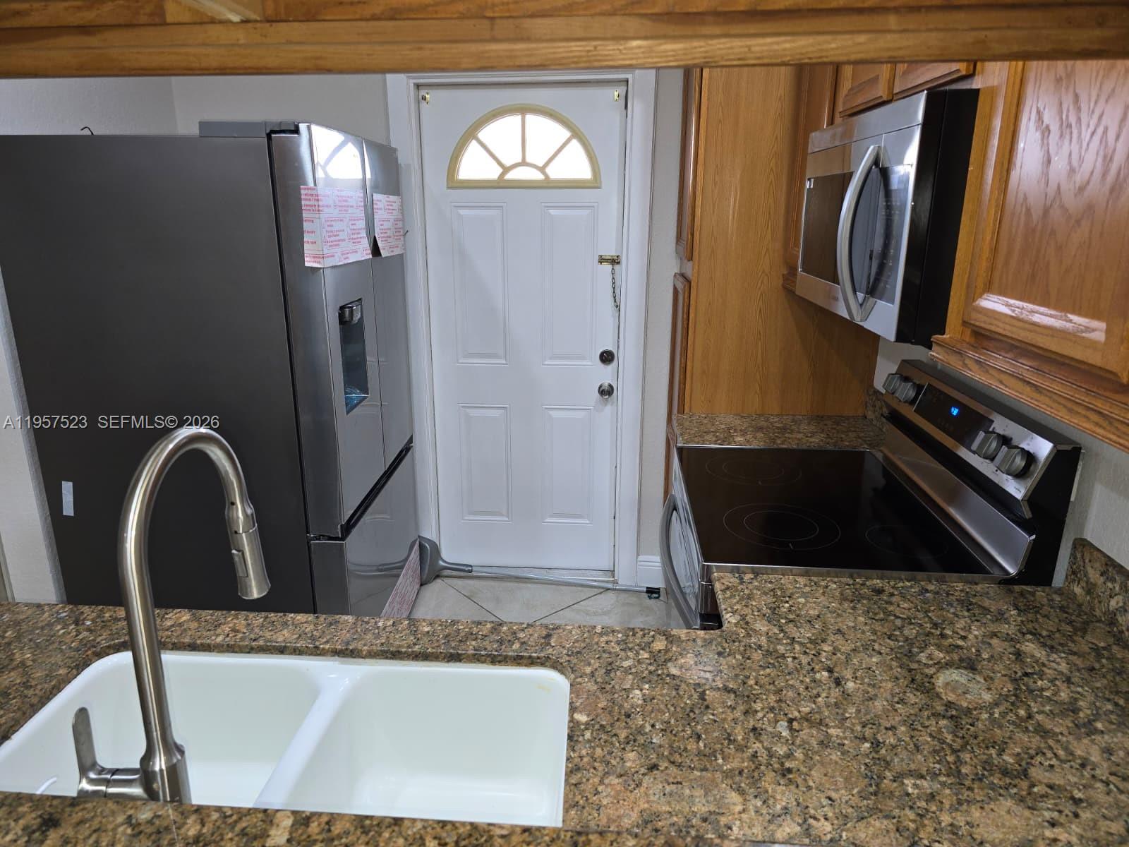 5151 W Oakland Park Blvd #303, Lauderdale Lakes FL 33313