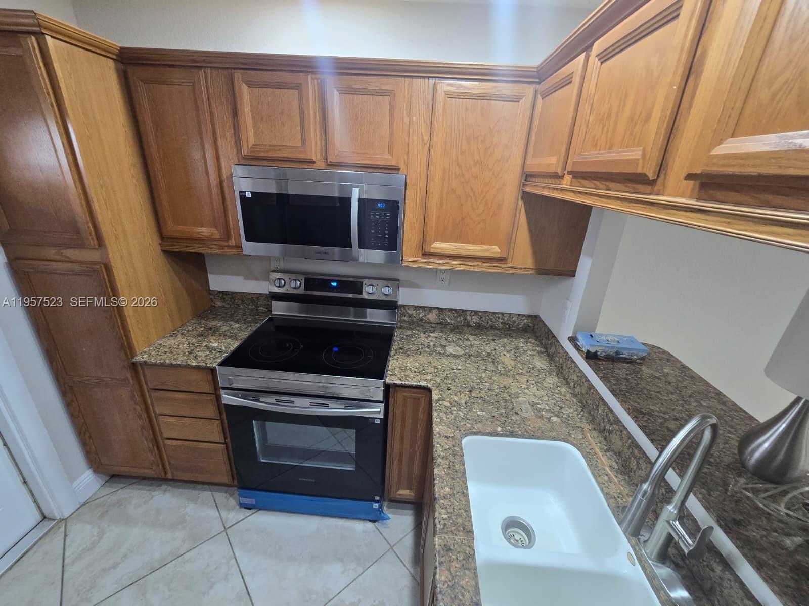 5151 W Oakland Park Blvd #303, Lauderdale Lakes FL 33313