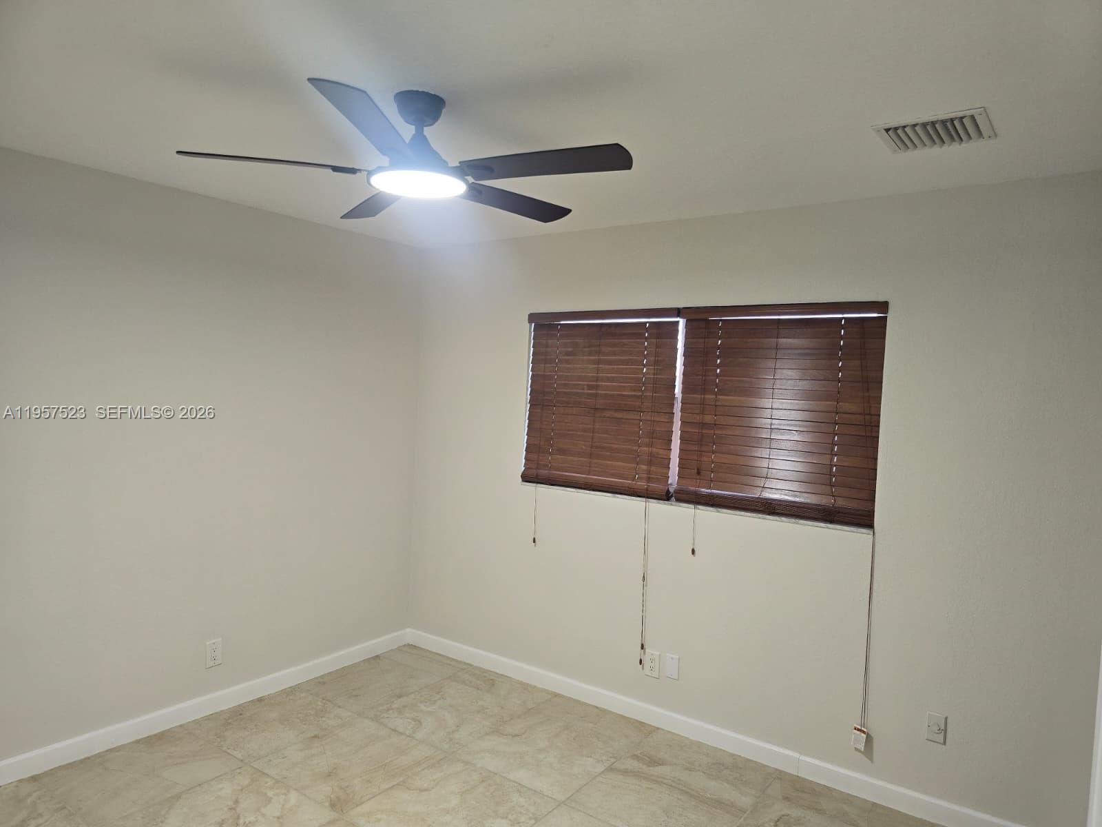 5151 W Oakland Park Blvd #303, Lauderdale Lakes FL 33313
