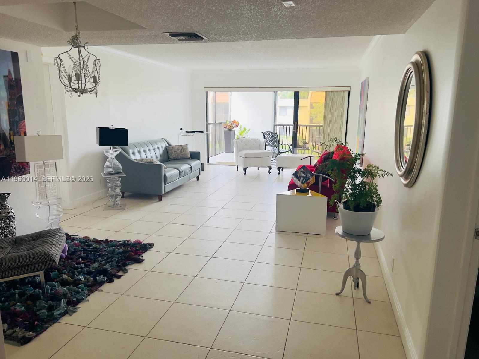 491 Racquet Club Rd #211, Weston FL 33326