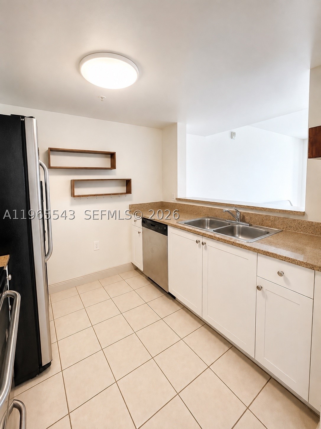 60 NW 37th Ave #1205, Miami FL 33125