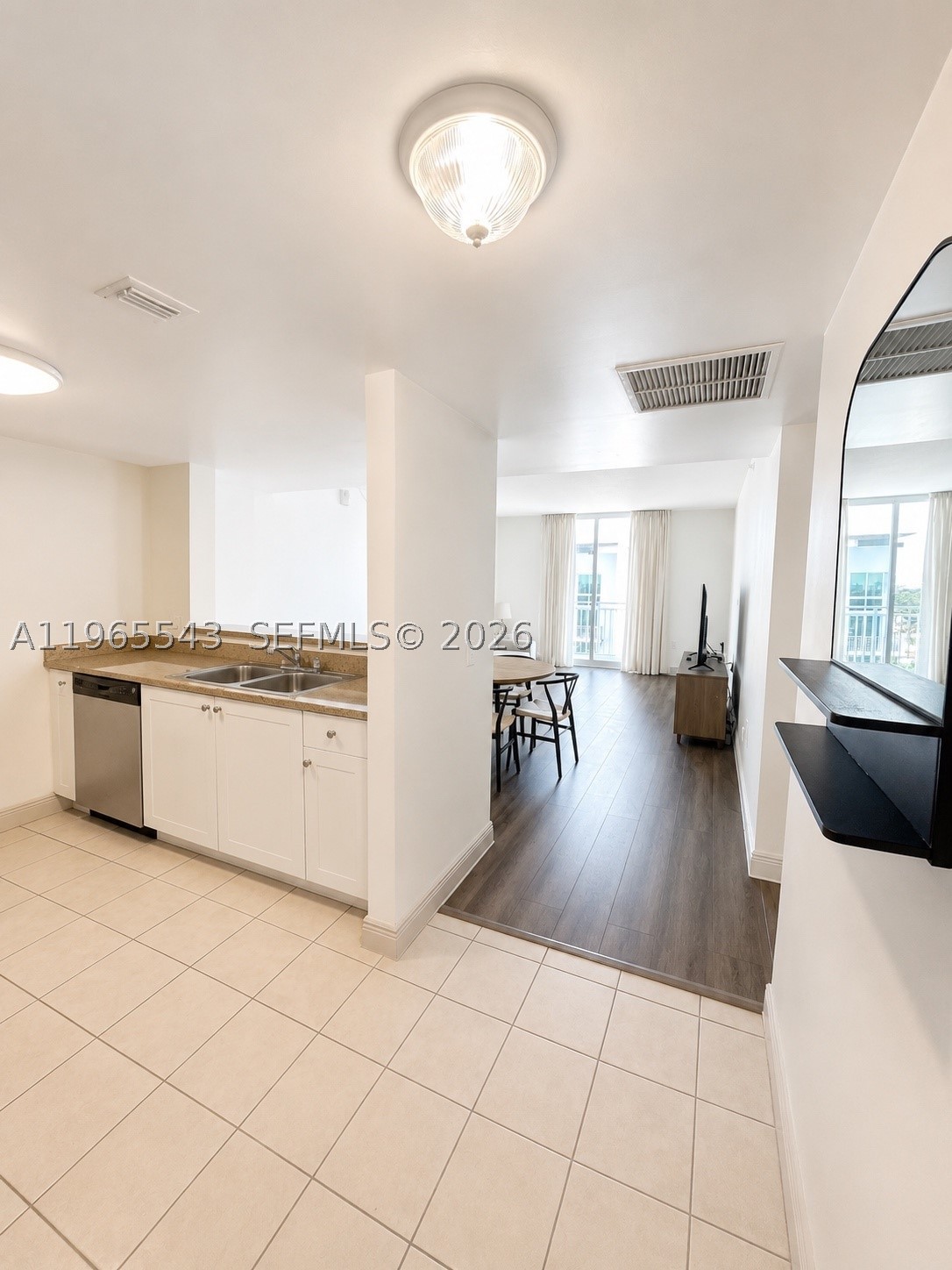 60 NW 37th Ave #1205, Miami FL 33125