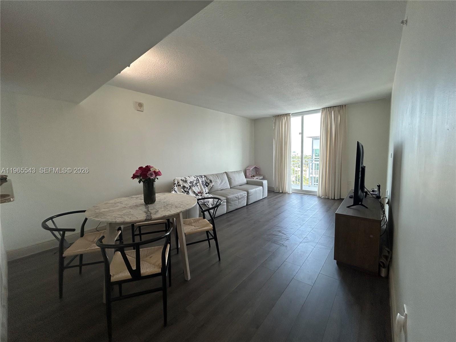 60 NW 37th Ave #1205, Miami FL 33125