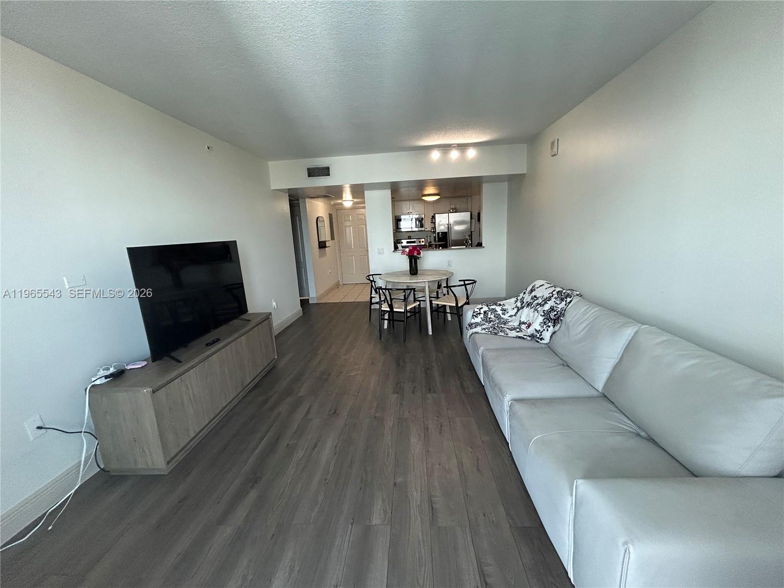 60 NW 37th Ave #1205, Miami FL 33125
