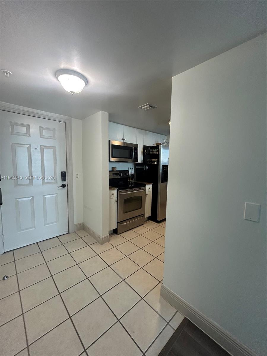 60 NW 37th Ave #1205, Miami FL 33125