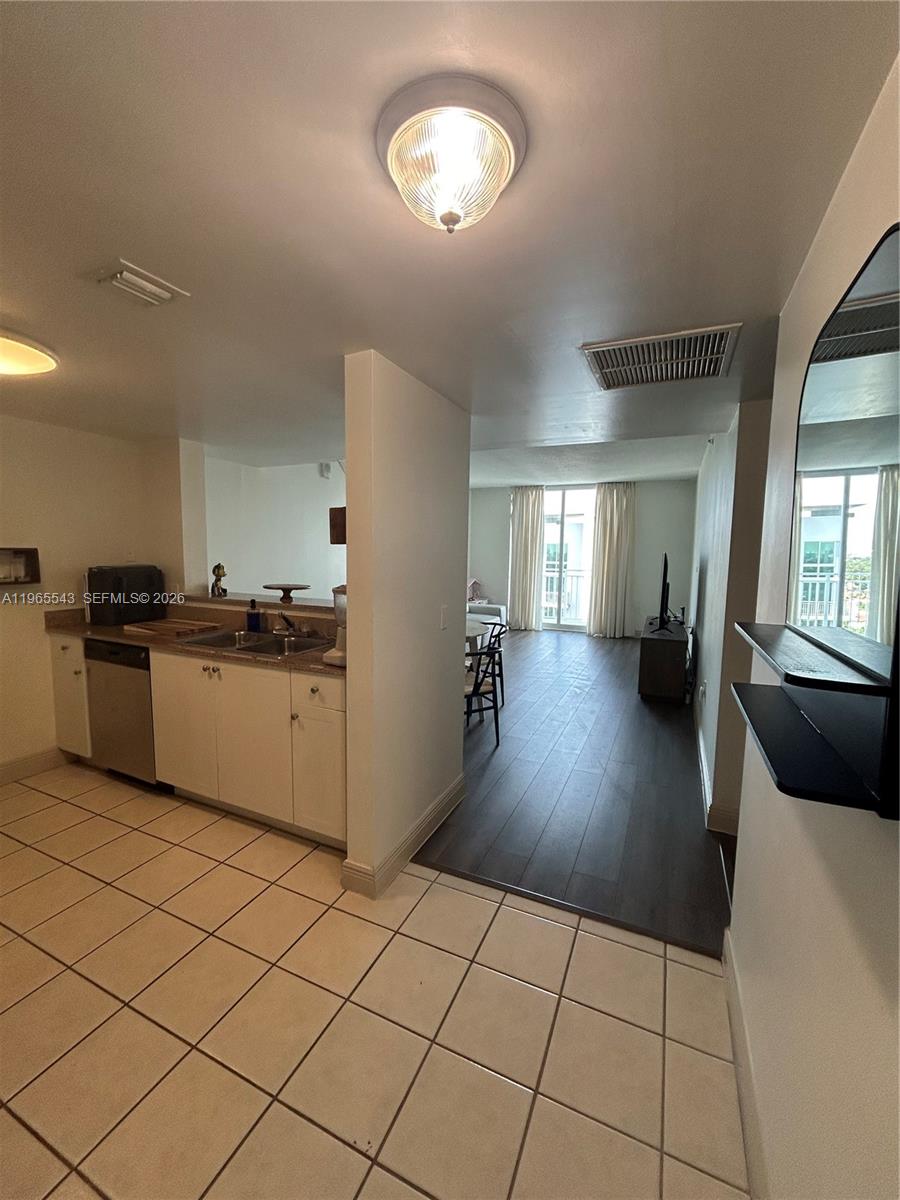 60 NW 37th Ave #1205, Miami FL 33125