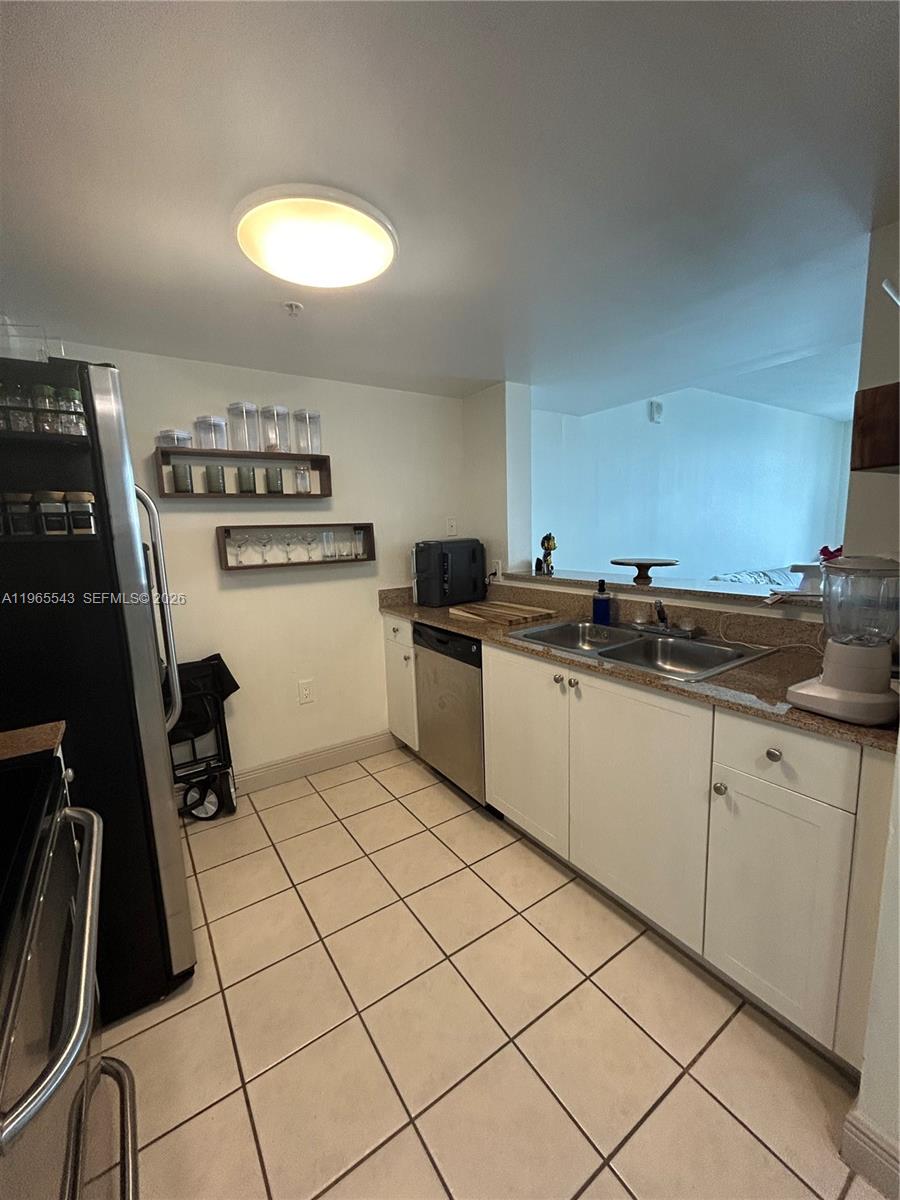 60 NW 37th Ave #1205, Miami FL 33125