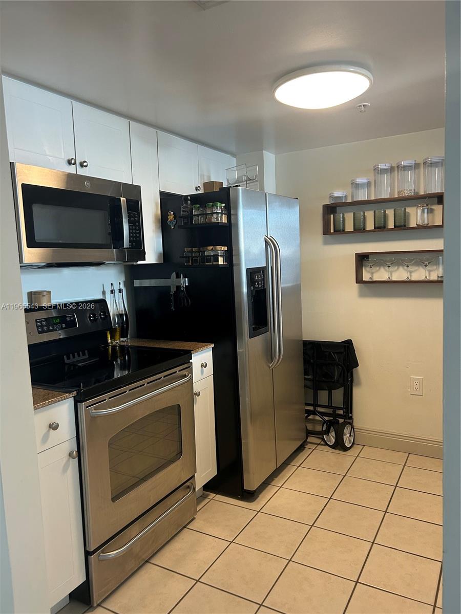 60 NW 37th Ave #1205, Miami FL 33125