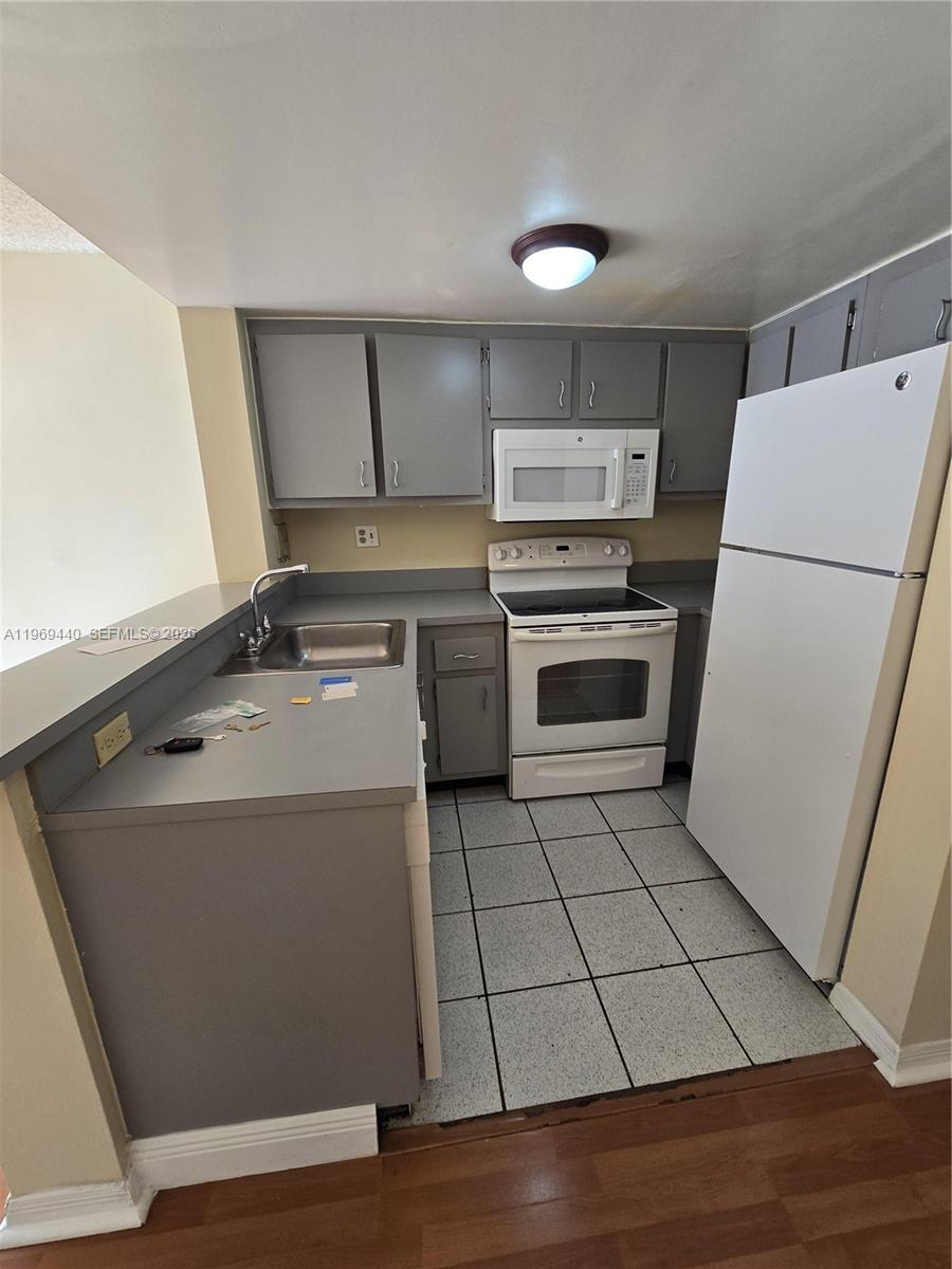 670 NW 85th Pl #11-210, Miami FL 33126