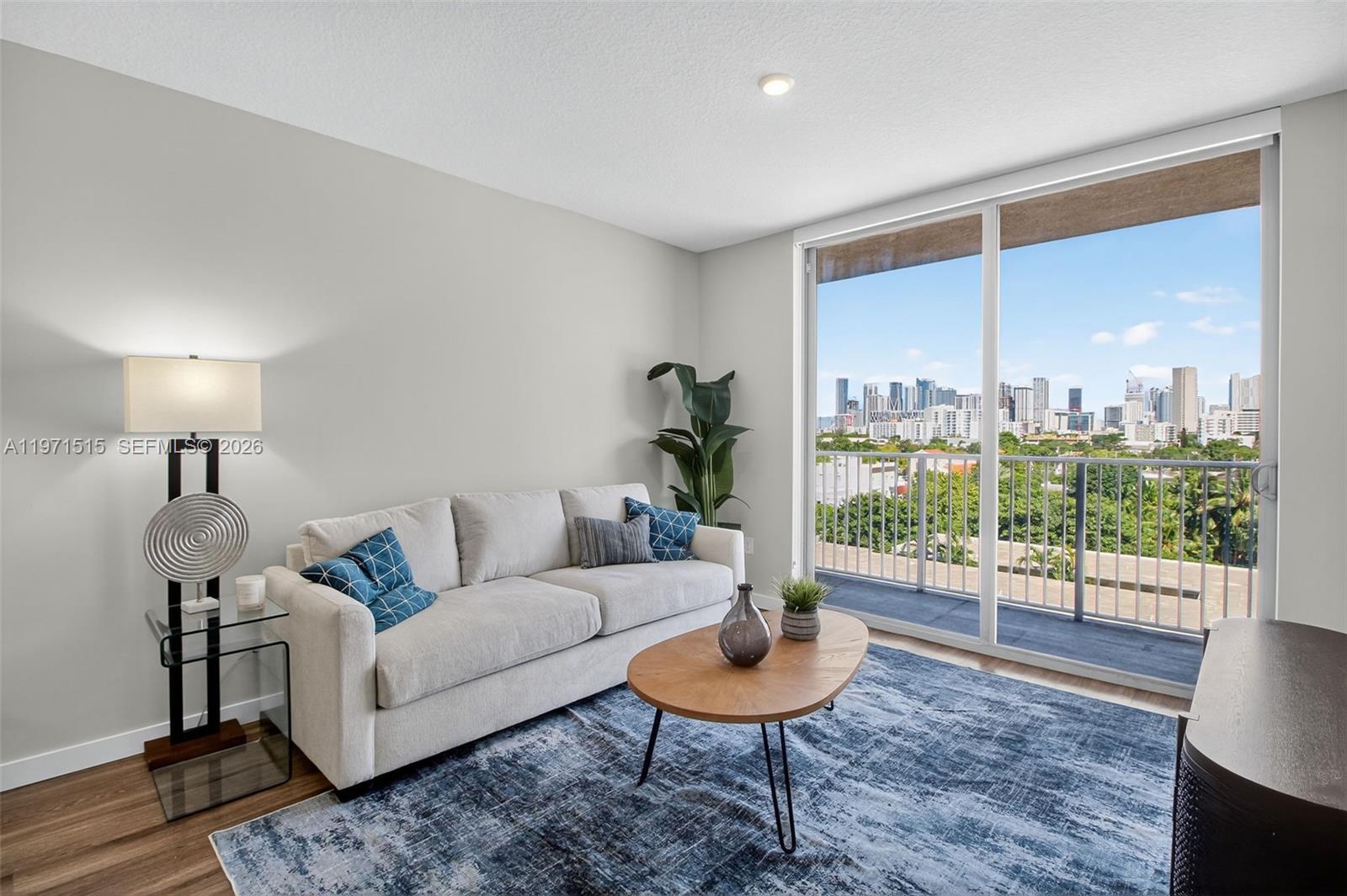 1110 NW 1 st #703, Miami FL 33128
