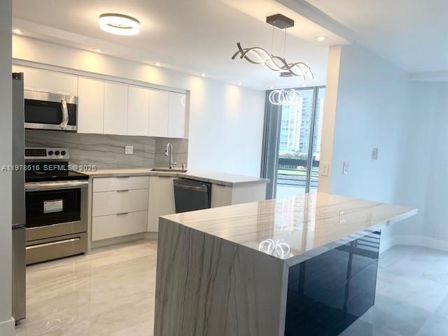3530 Mystic Pointe Dr #702, Aventura FL 33180