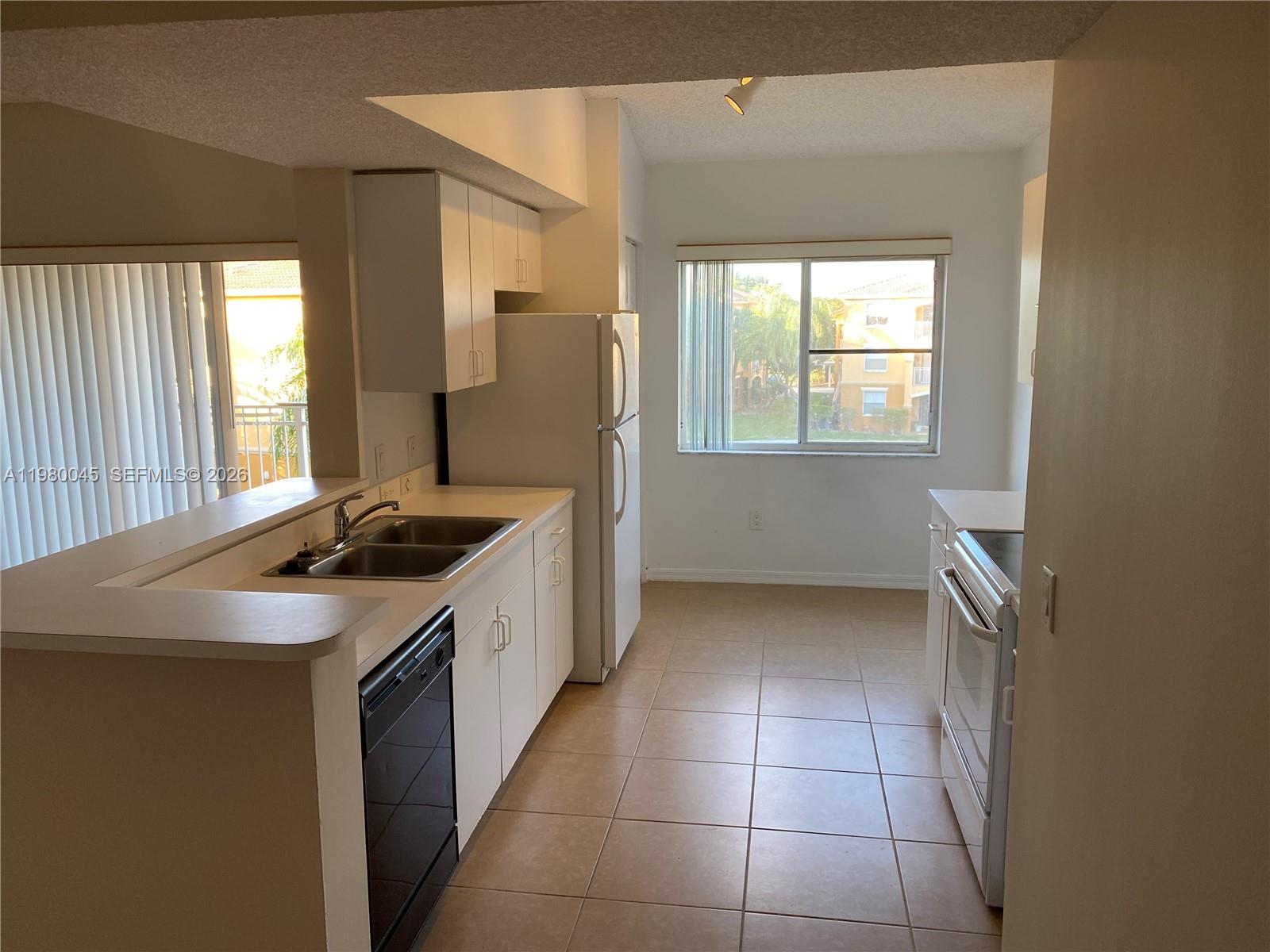9645 NW 1ST CT #1-302, Pembroke Pines FL 33024