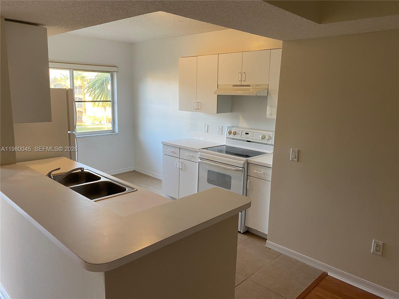 9645 NW 1ST CT #1-302, Pembroke Pines FL 33024