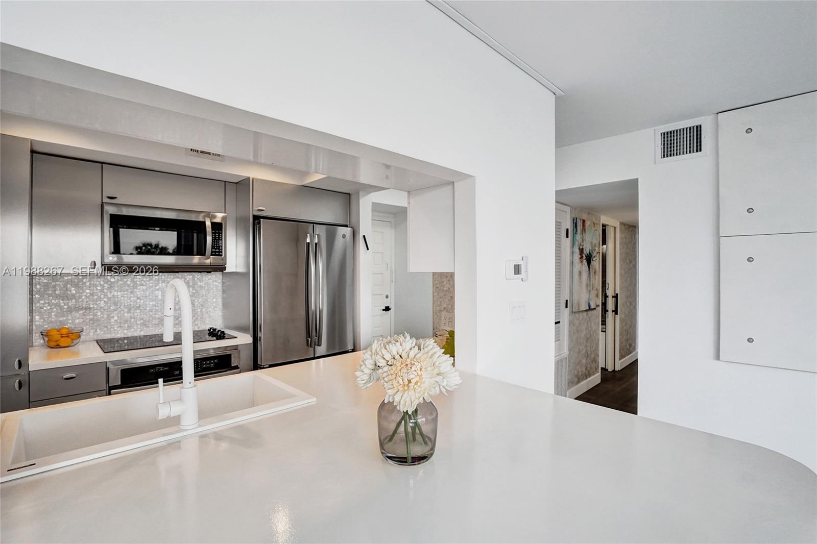 430 Golden Isles Dr #201, Hallandale Beach FL 33009