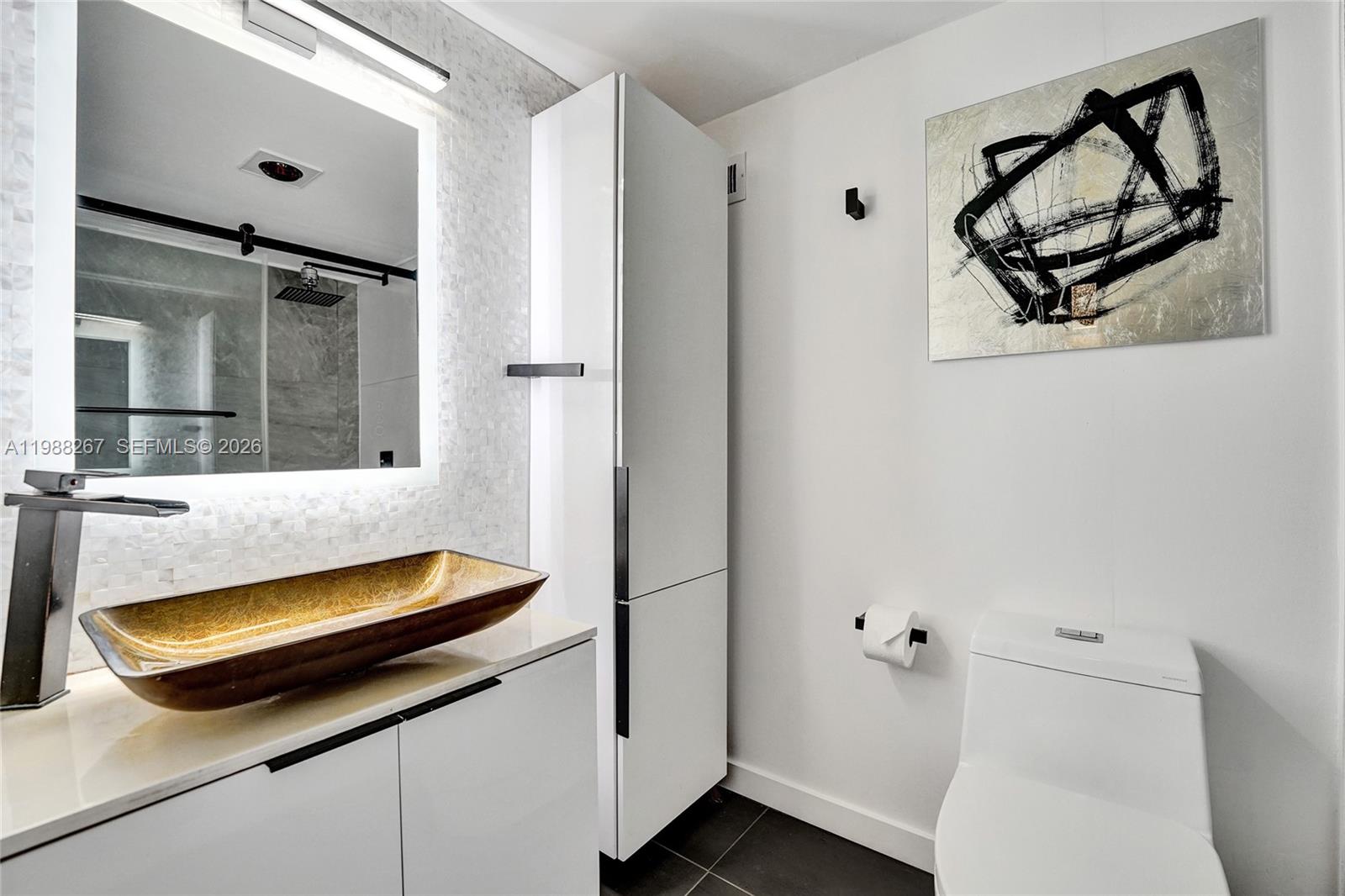 430 Golden Isles Dr #201, Hallandale Beach FL 33009