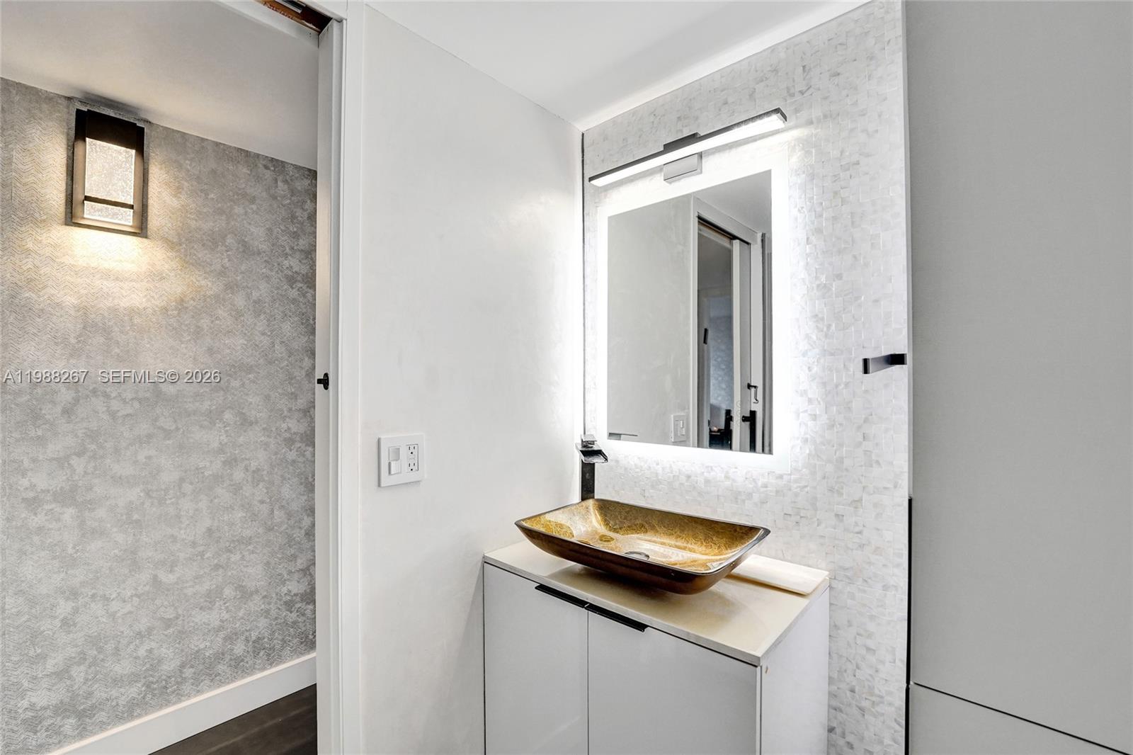 430 Golden Isles Dr #201, Hallandale Beach FL 33009
