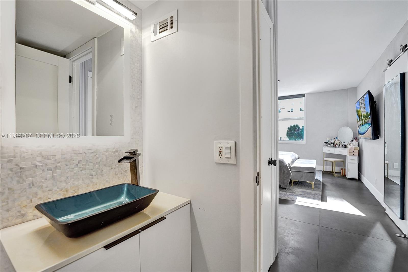 430 Golden Isles Dr #201, Hallandale Beach FL 33009