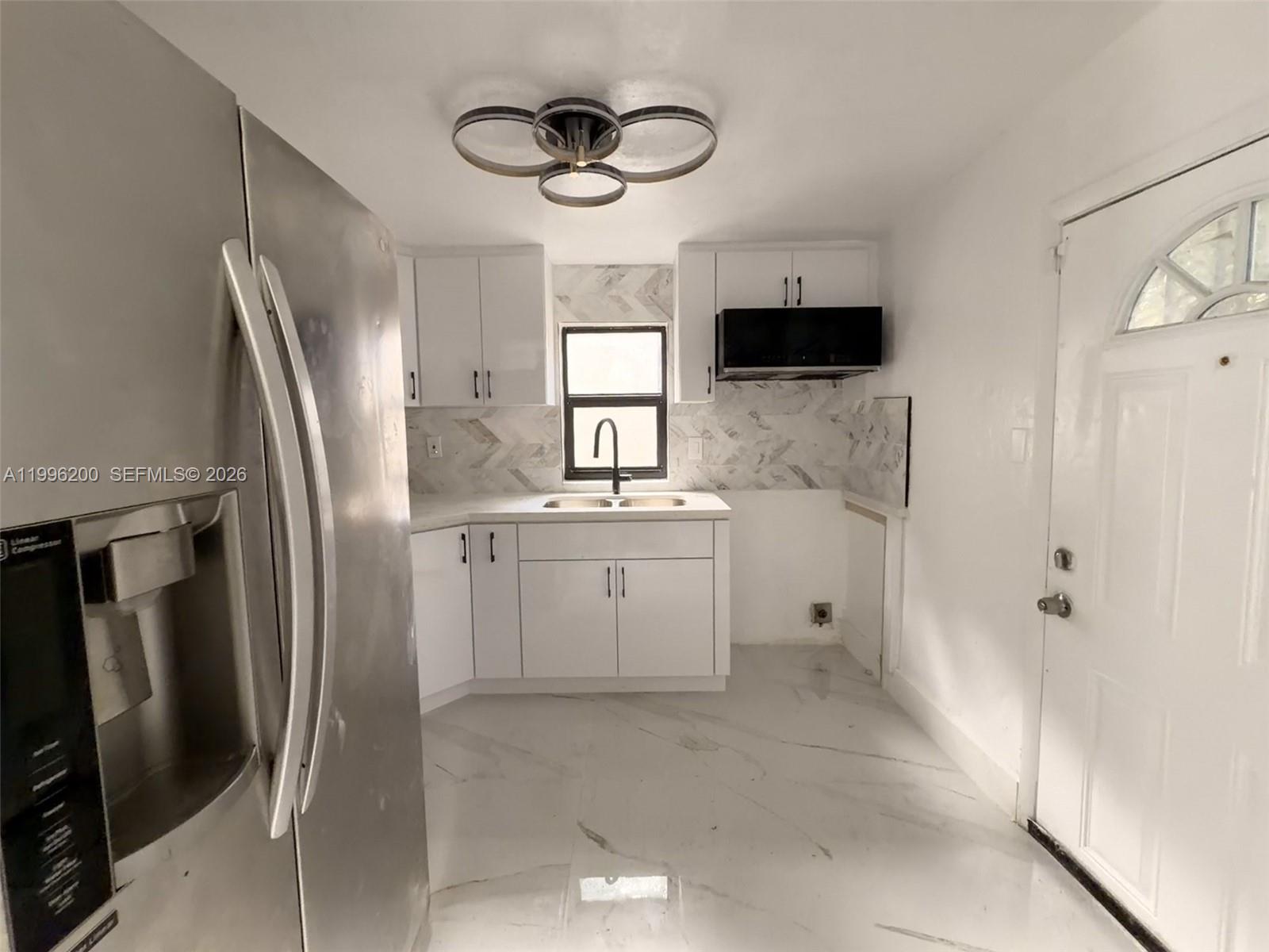1261 NW 45th St, Miami FL 33142
