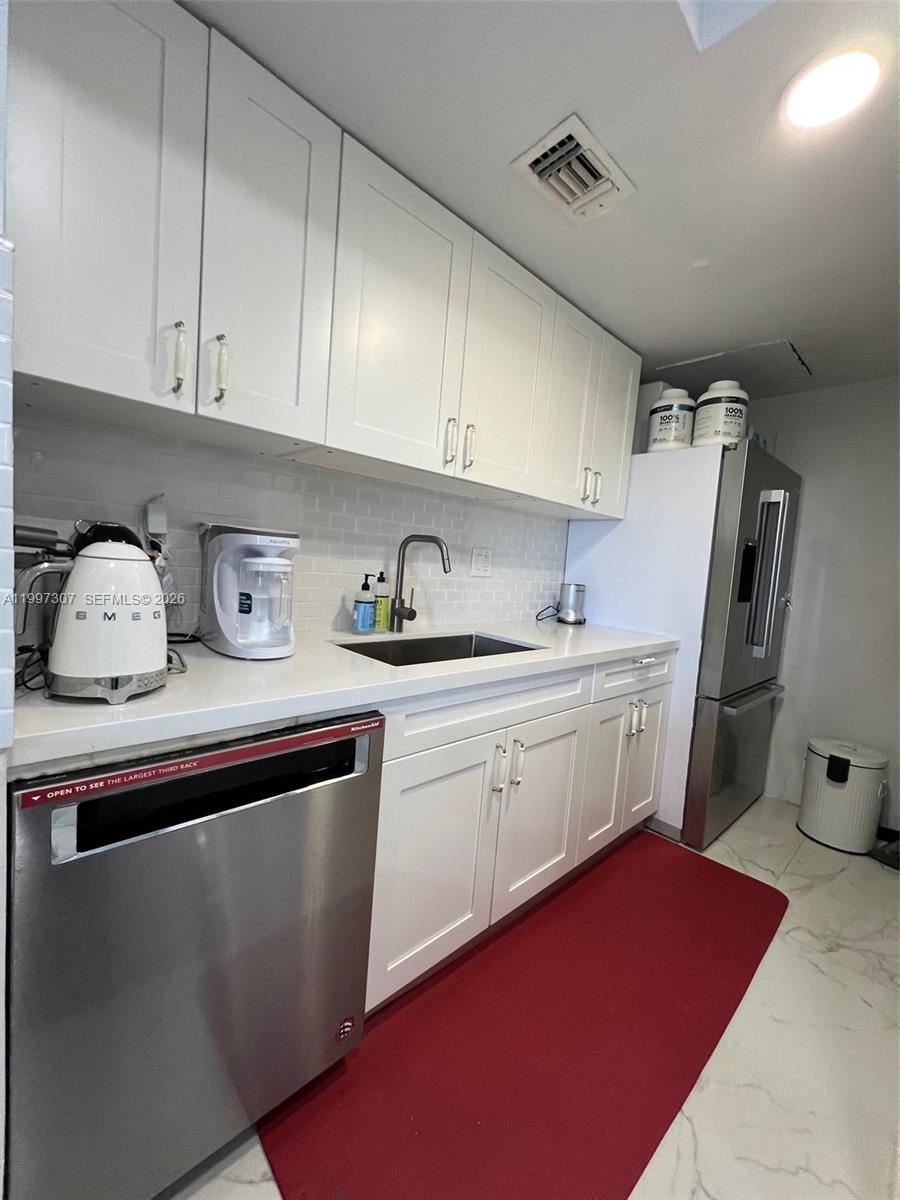 880 NE 69th St #11M, Miami FL 33138