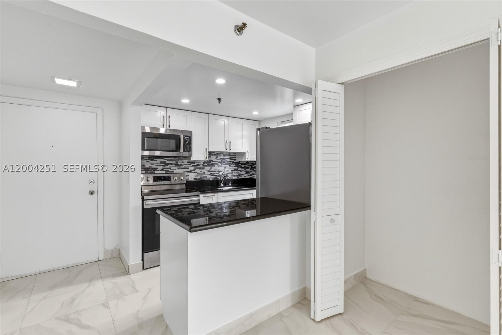 140 NW 14th Ave #9, Miami FL 33125