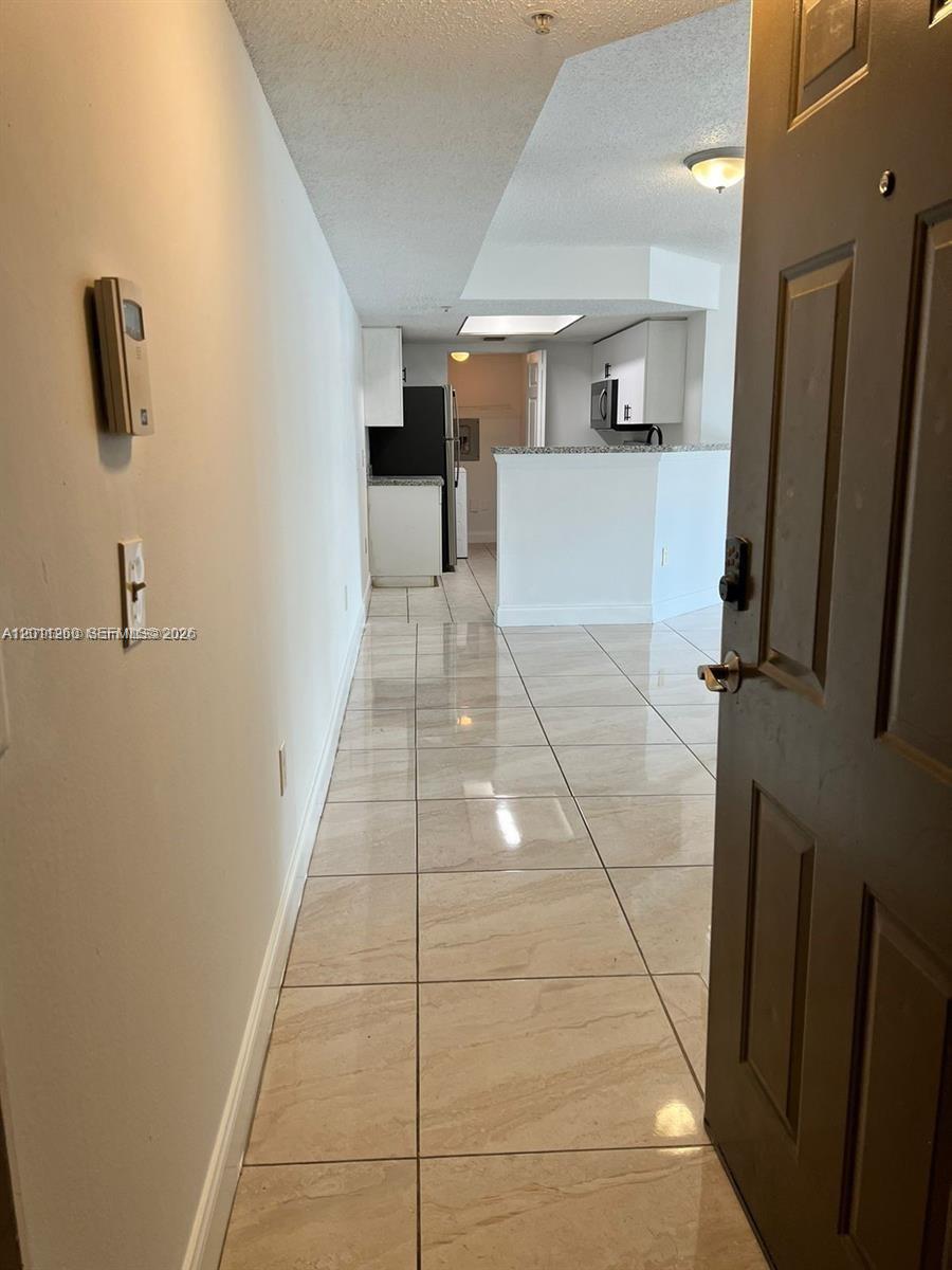 5065 Wiles Rd #103, Coconut Creek FL 33073