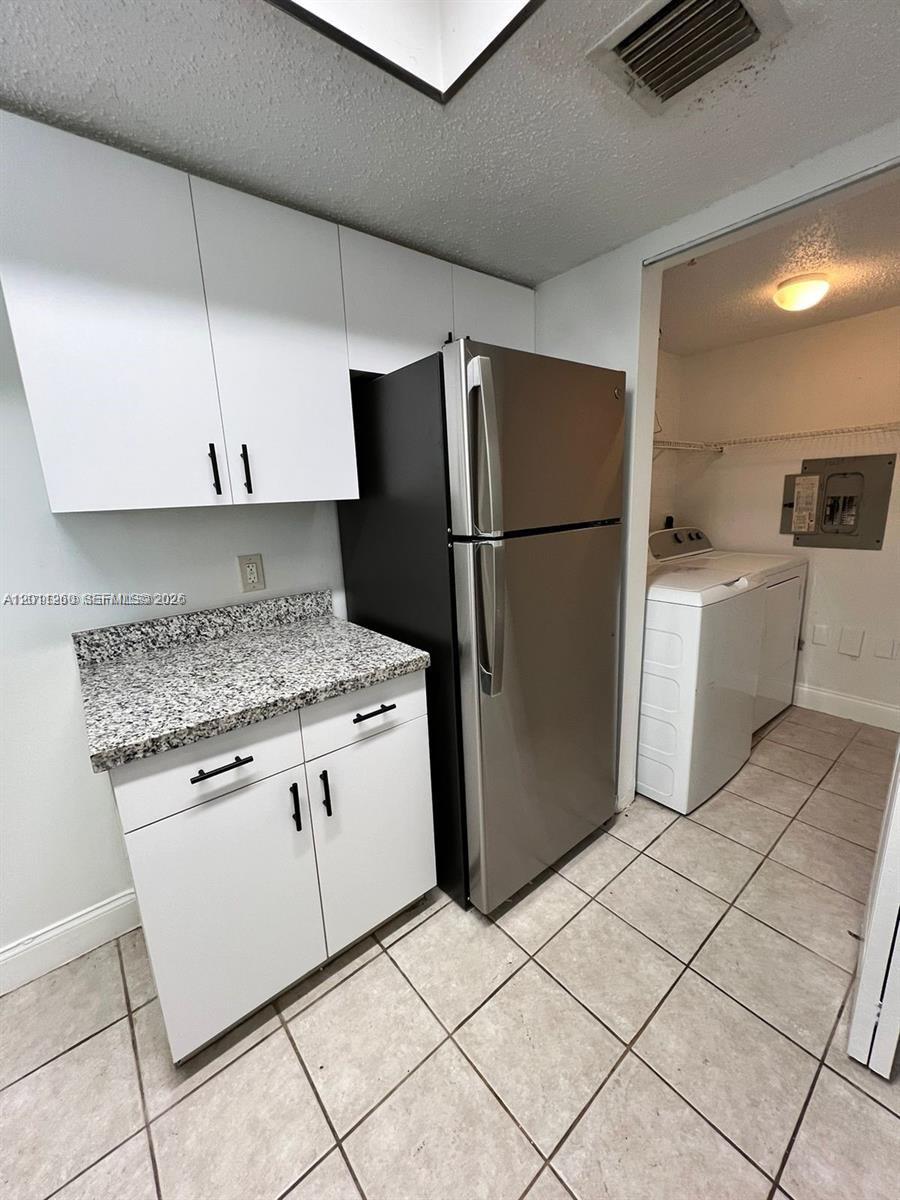 5065 Wiles Rd #103, Coconut Creek FL 33073