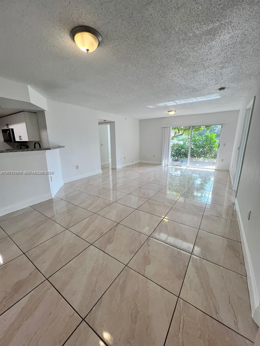 5065 Wiles Rd #103, Coconut Creek FL 33073
