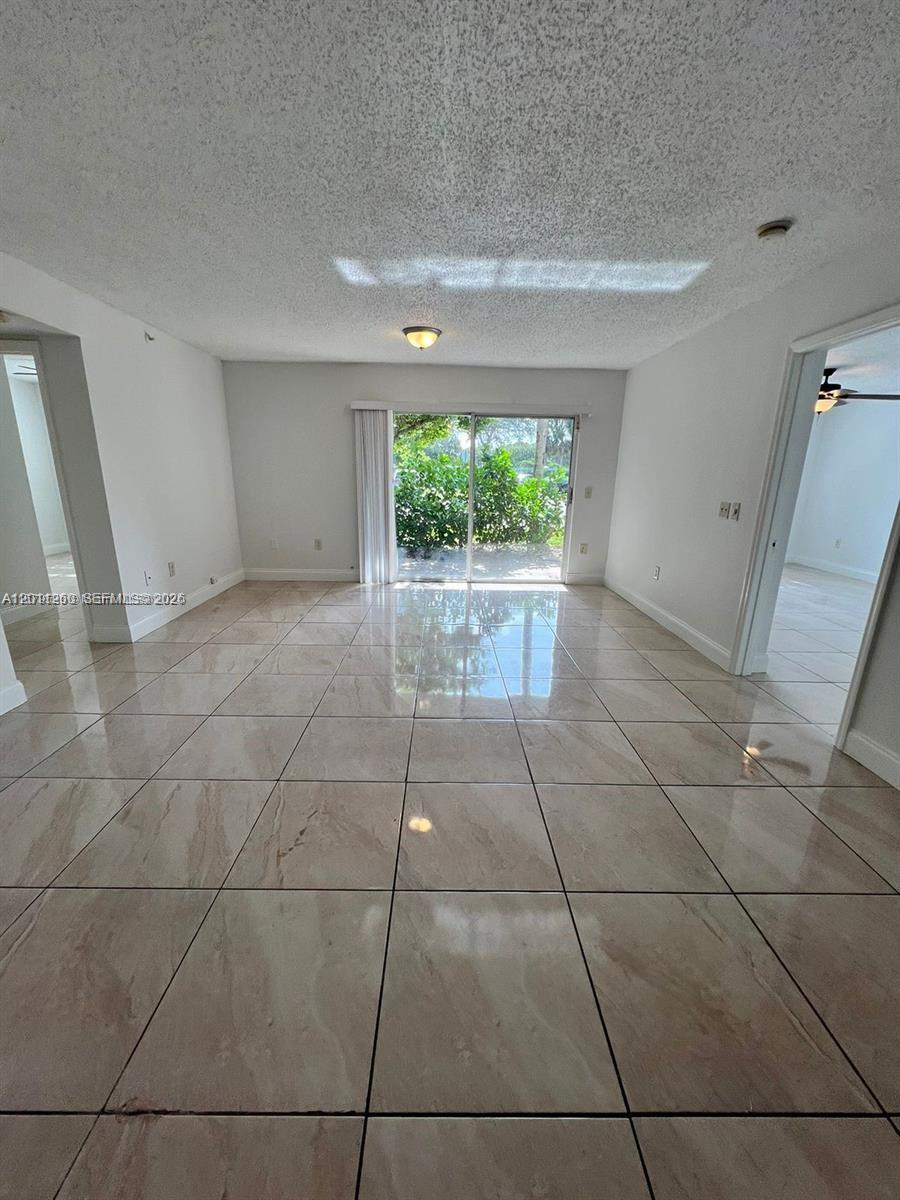 5065 Wiles Rd #103, Coconut Creek FL 33073