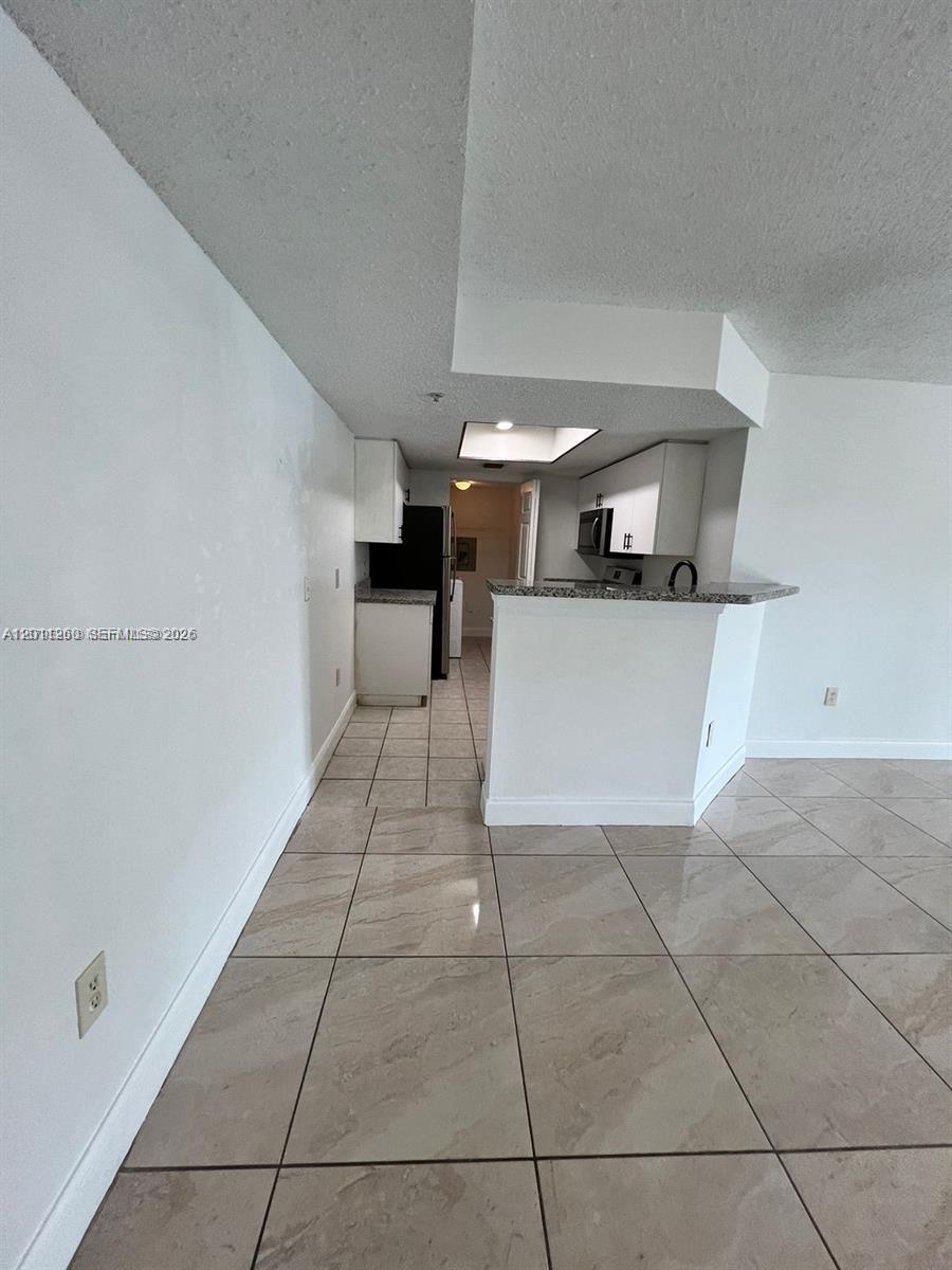 5065 Wiles Rd #103, Coconut Creek FL 33073