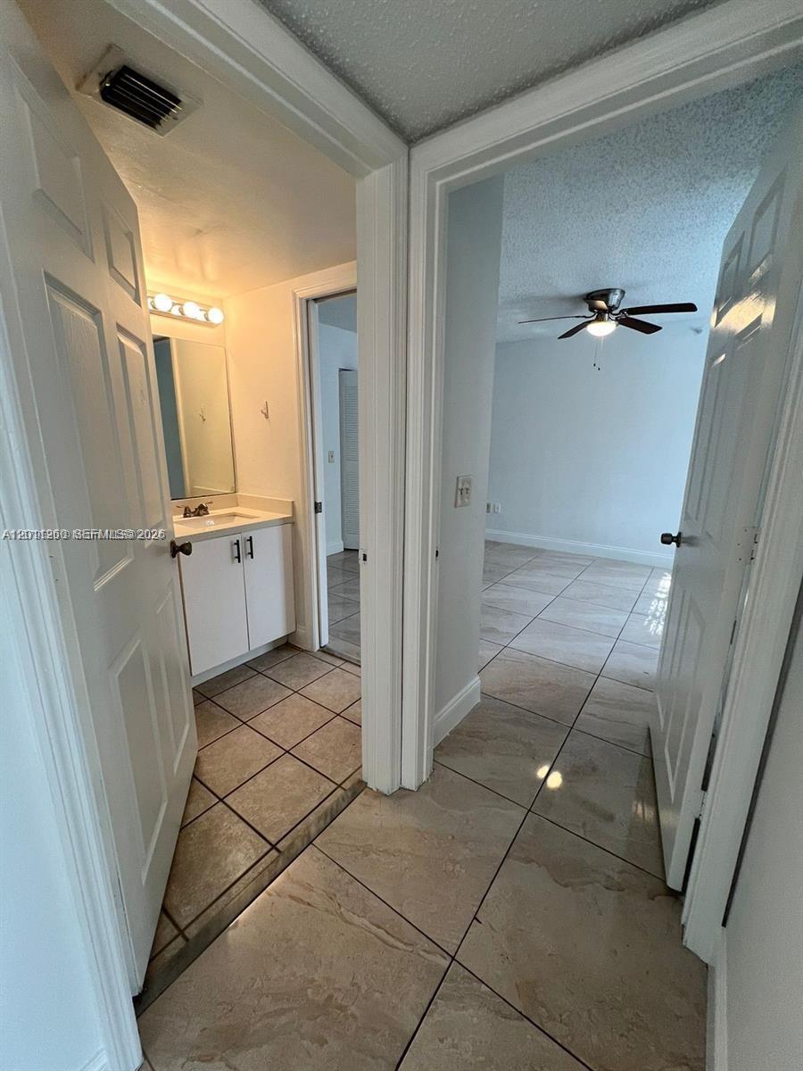 5065 Wiles Rd #103, Coconut Creek FL 33073
